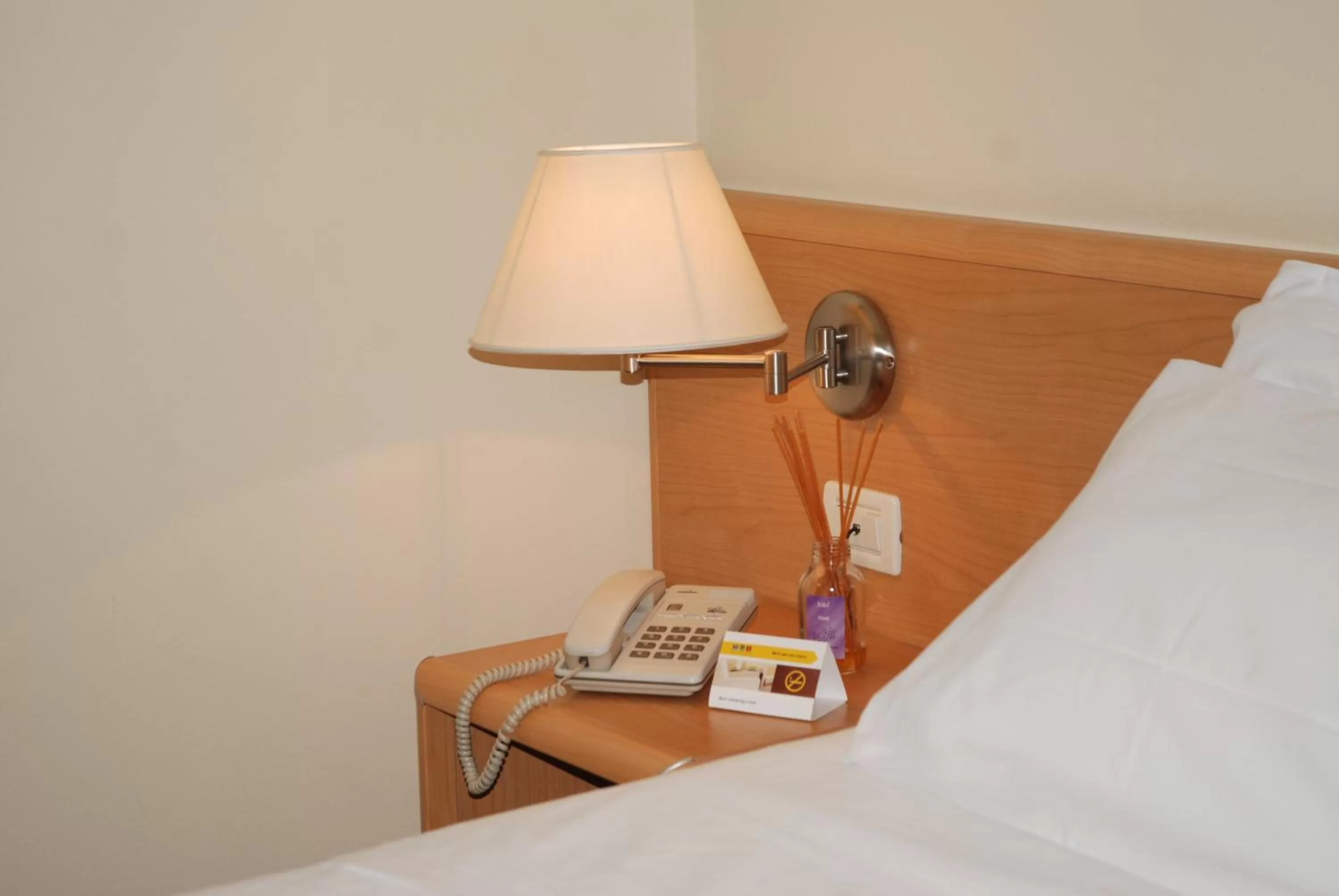 Photo of the whole room, Bed in Hotel Continental Brescia