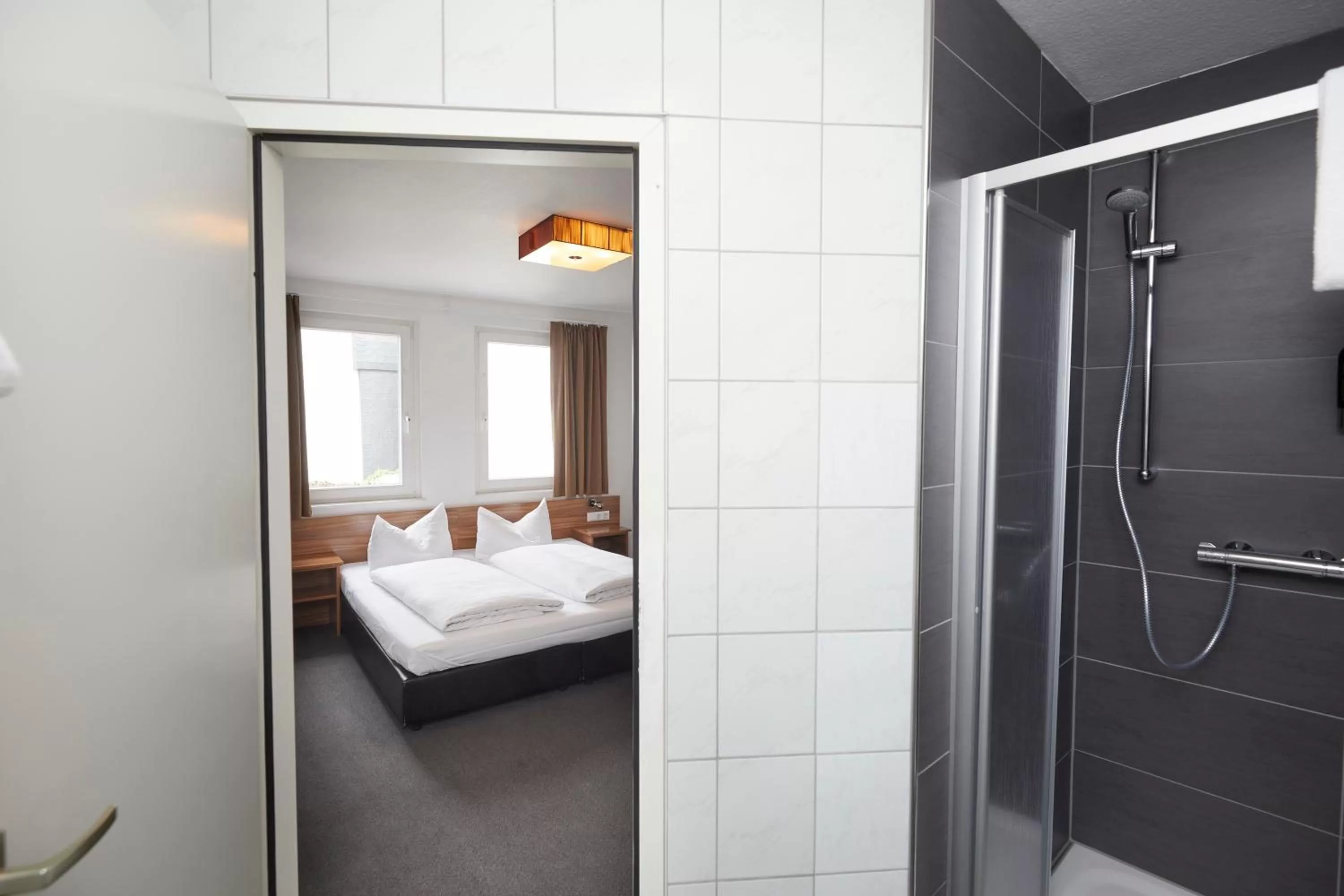 Photo of the whole room, Bed in Hotel Schlemmer Das familäre Altstadt - Hotel mit Herz