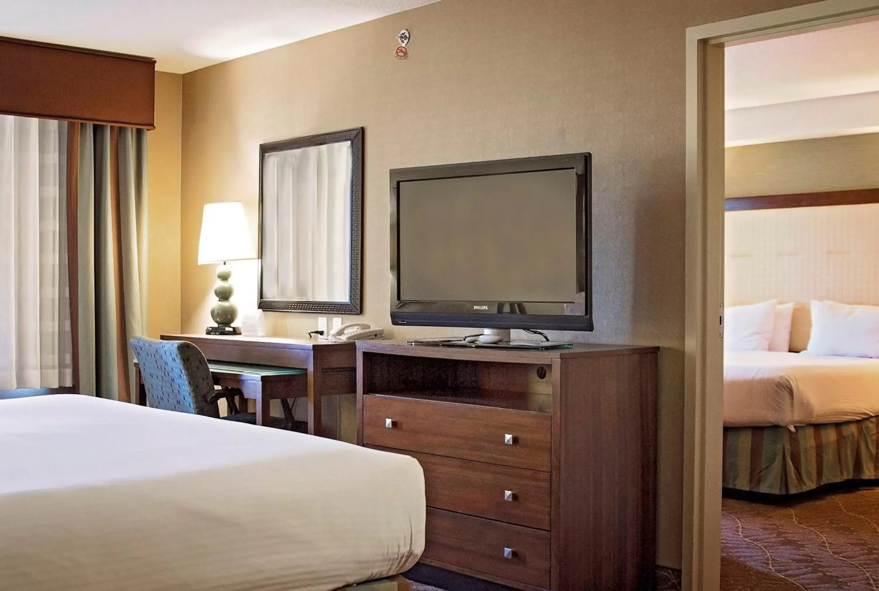 Photo of the whole room, TV/Entertainment Center in Holiday Inn Express & Suites Logan, an IHG Hotel