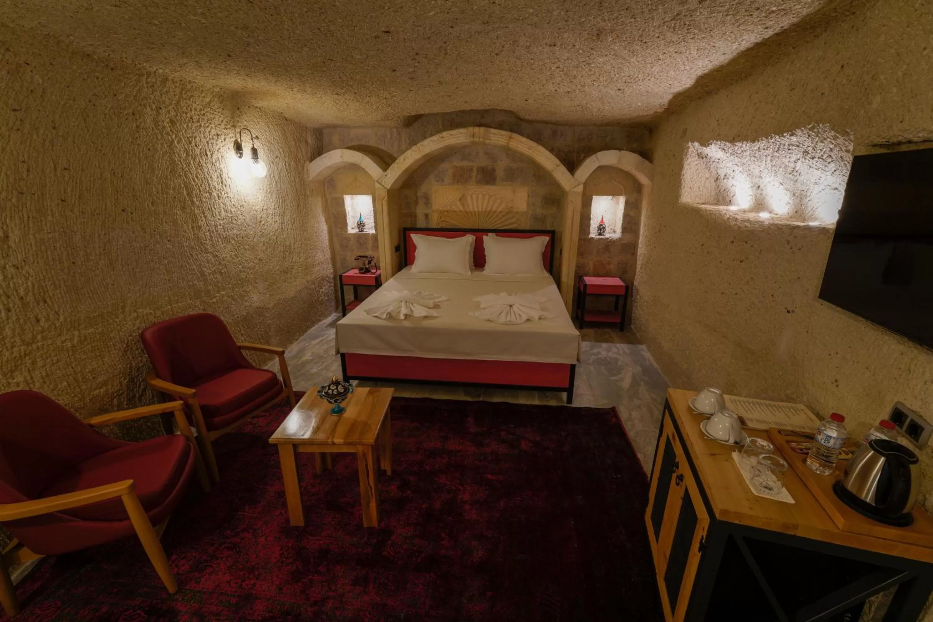 Bed in The Niche Cave Hotel