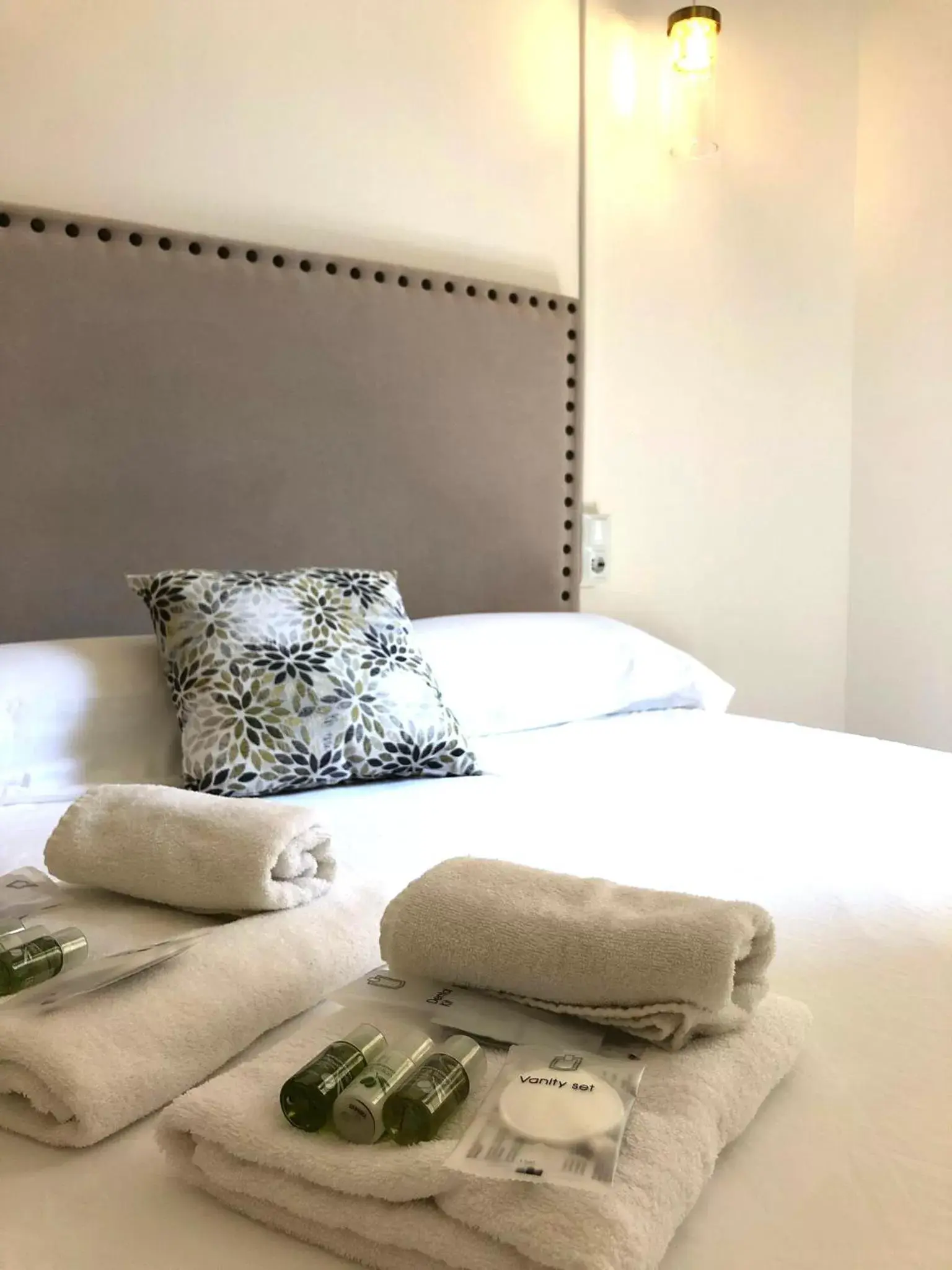 Bed in Siboni Luxury Rooms - Adults Only