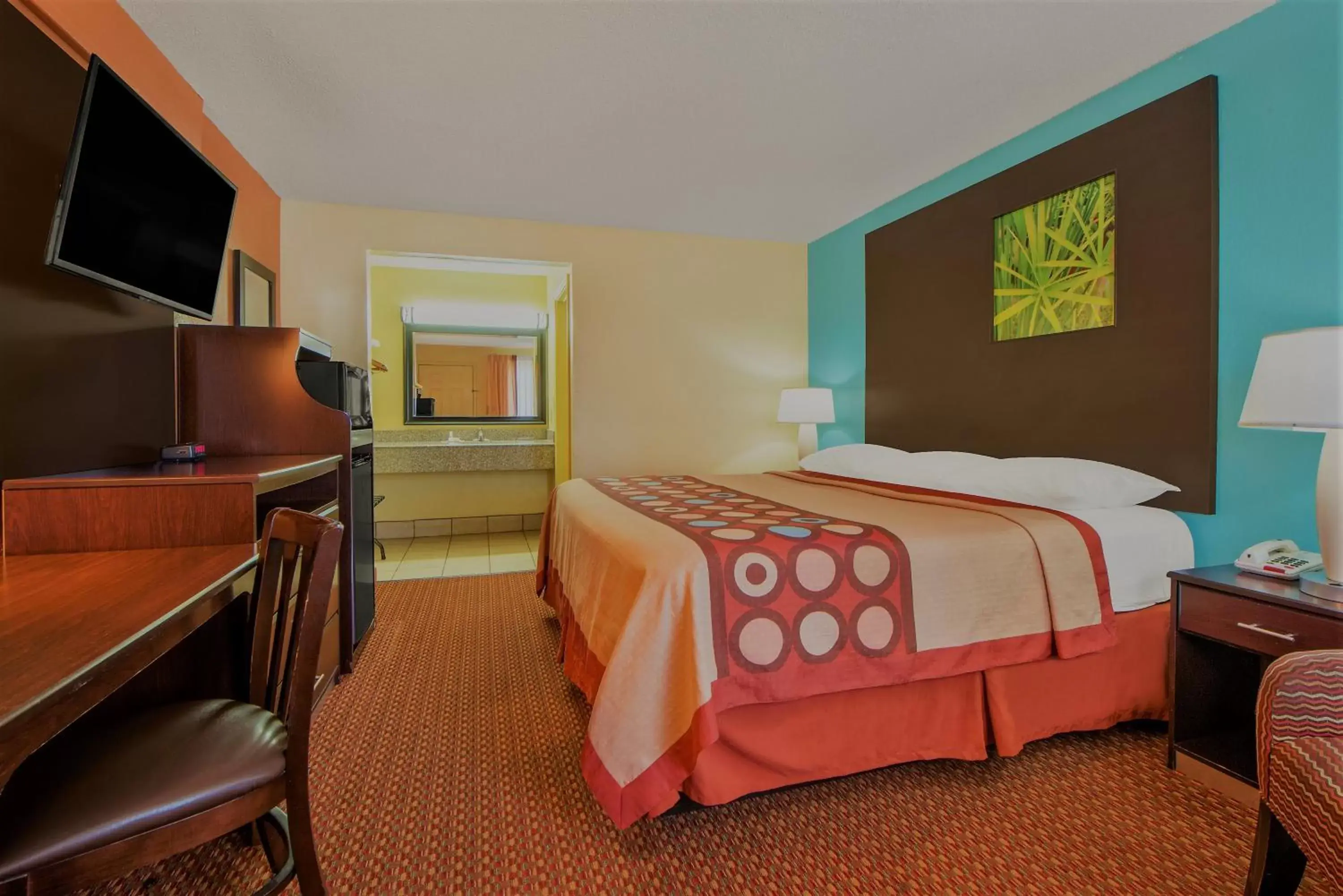 Bed in Super 8 by Wyndham Tulsa