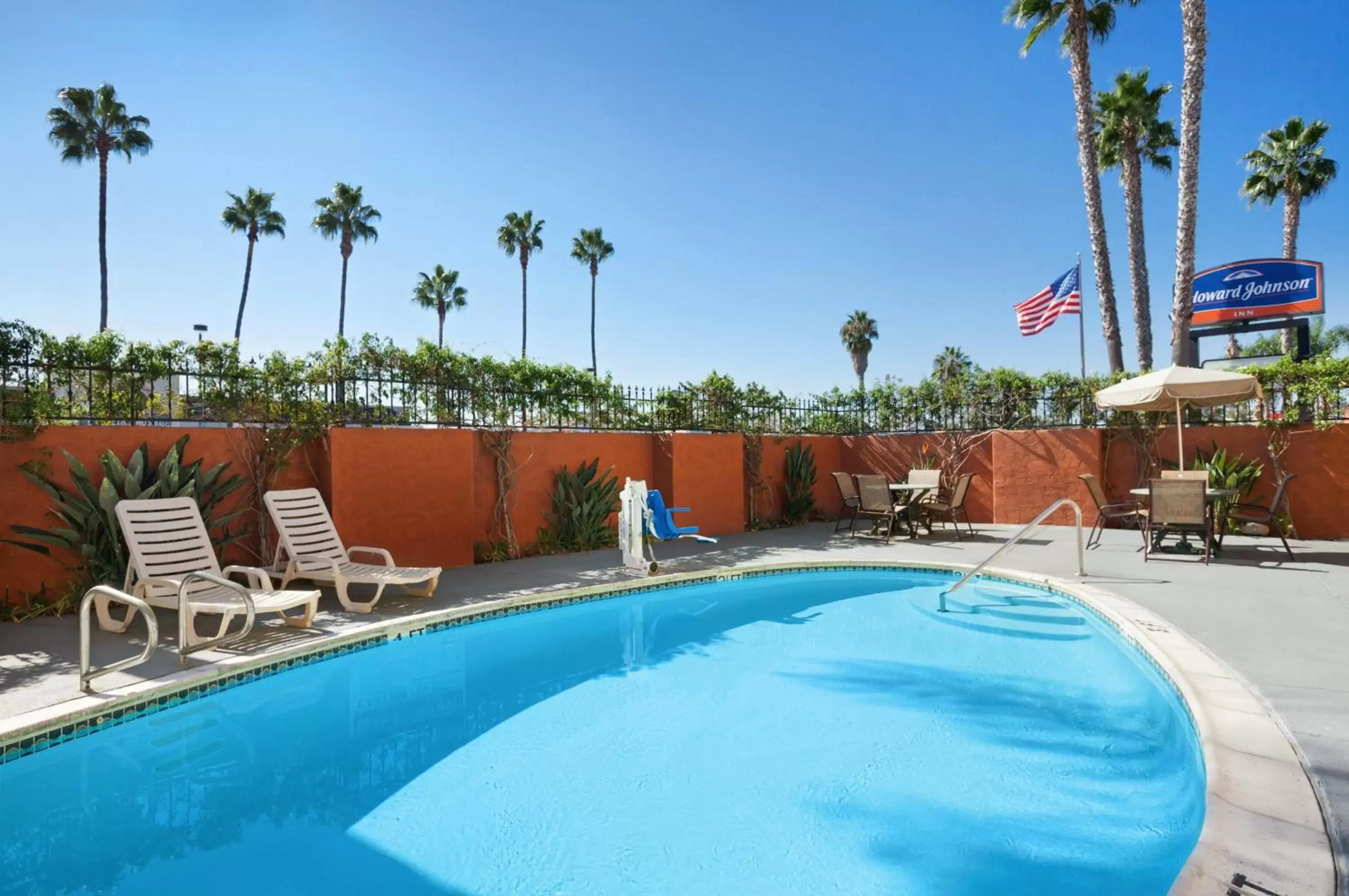 Patio, Swimming Pool in Howard Johnson by Wyndham San Diego Sea World