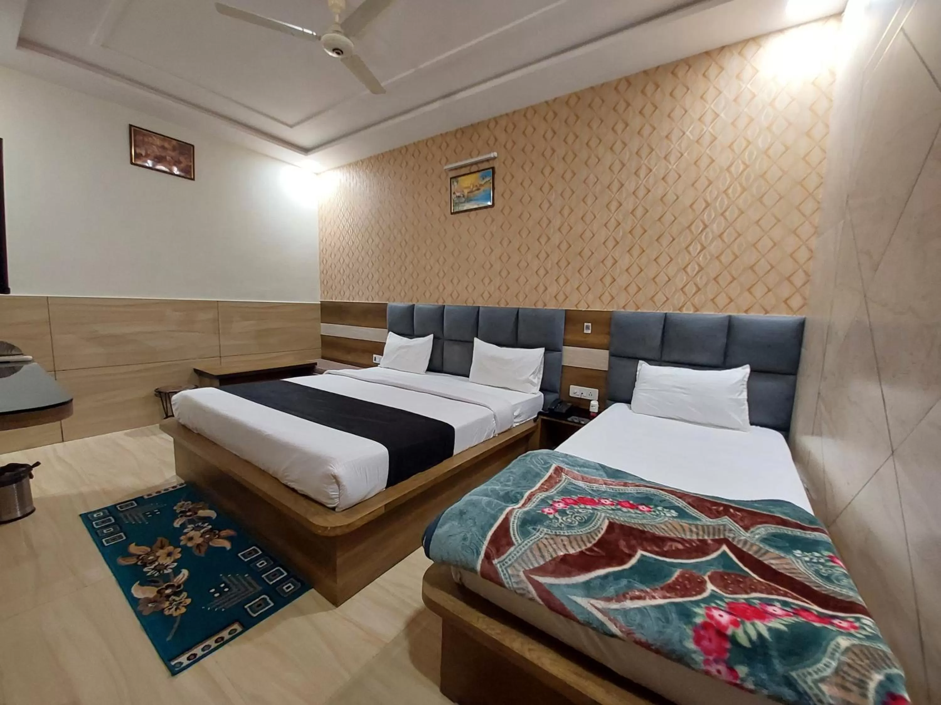 Photo of the whole room, Bed in Taj Nice Point Manage by Taj Sunrise Group