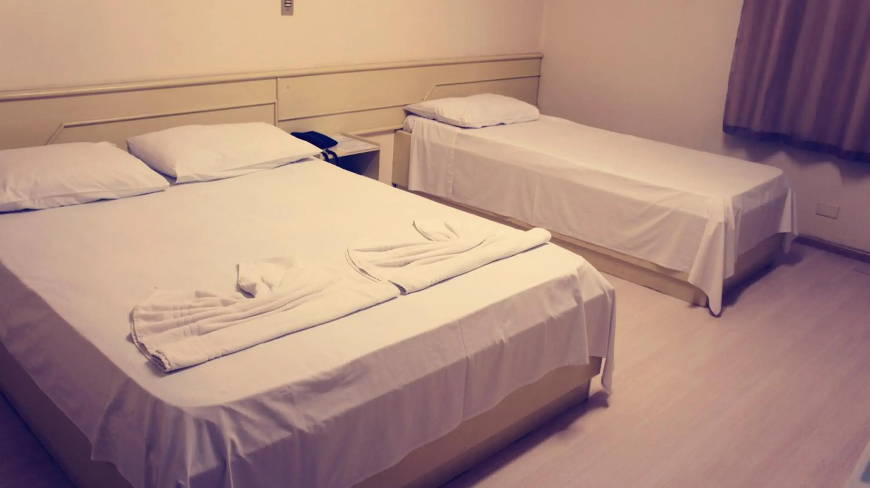 Bed in Alvorada Iguassu Hotel
