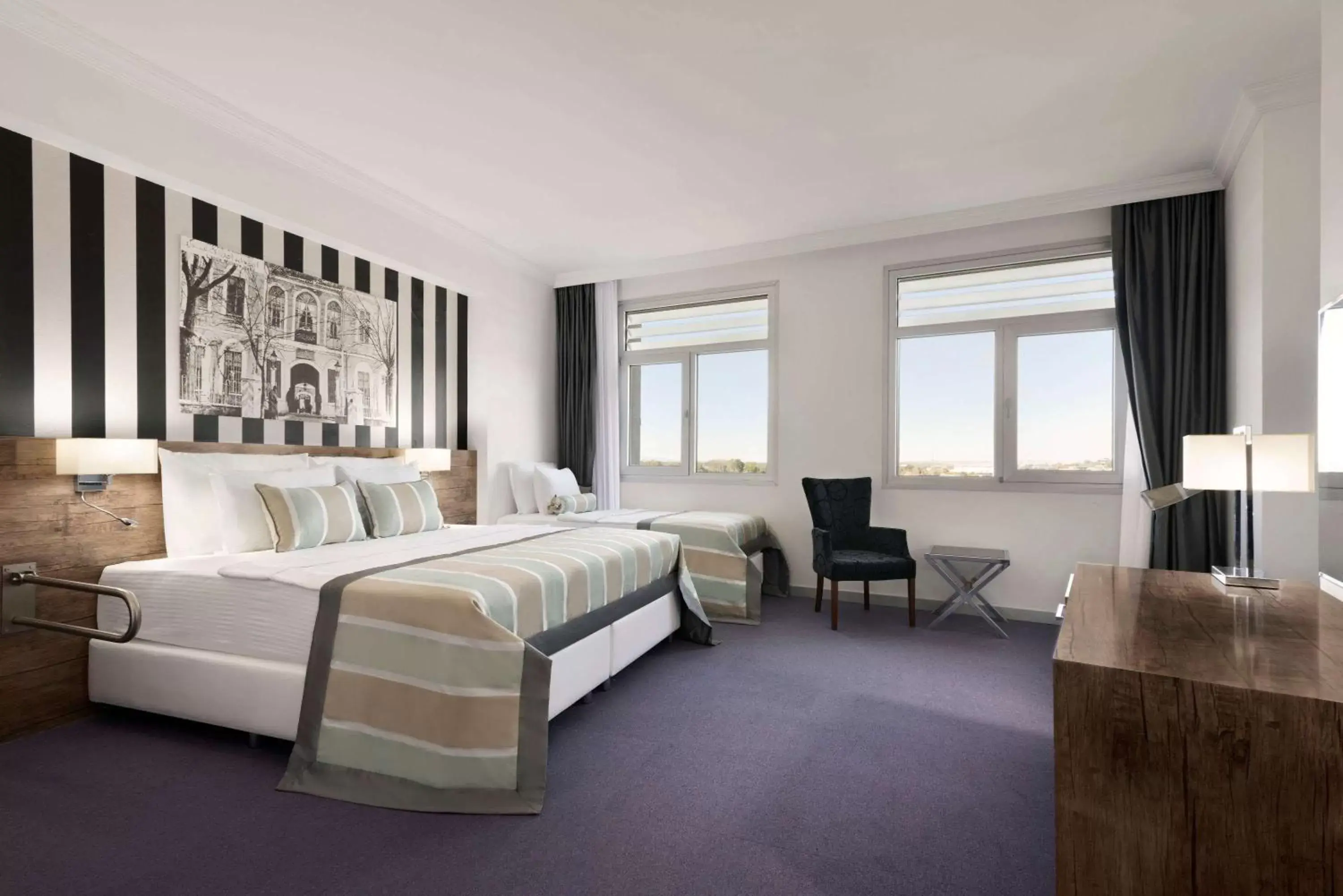 Communal lounge/ TV room, Bed in Ramada Hotel by Wyndham Edirne Communal lounge/ TV room, Bed in Ramada Hotel by Wyndham Edirne