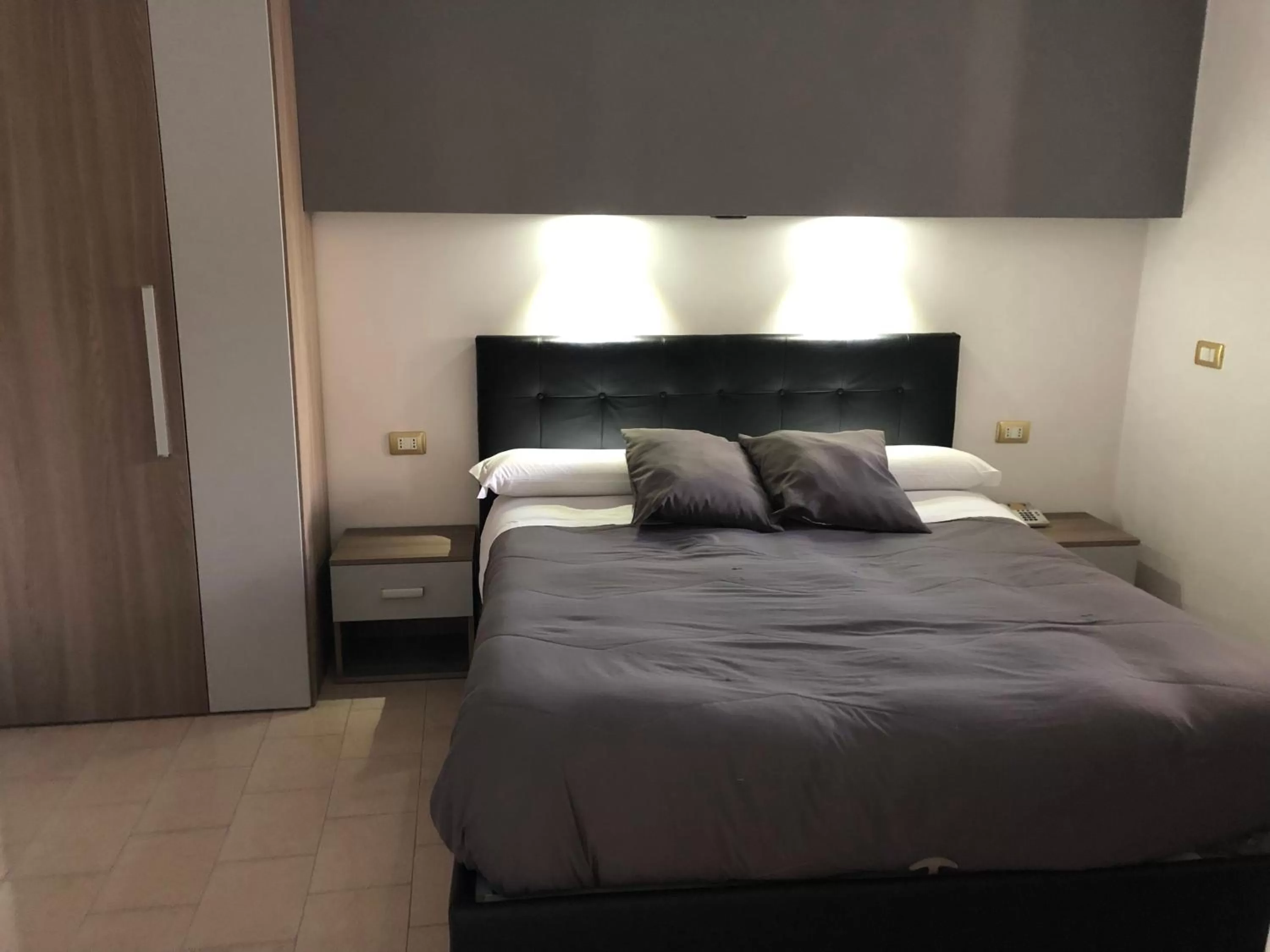 Bed in Hotel Nettuno