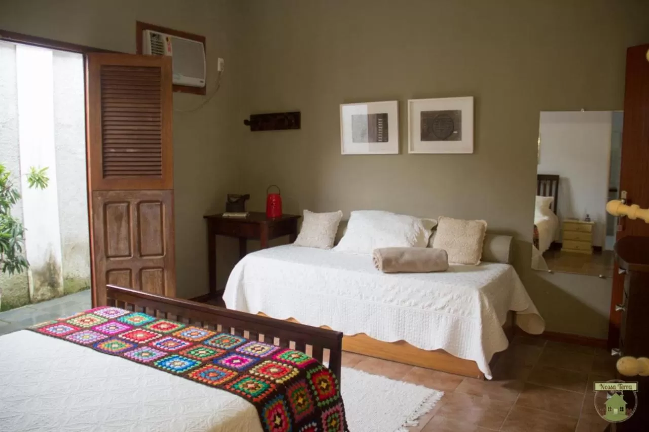 Bed in Pousada Nossa Terra