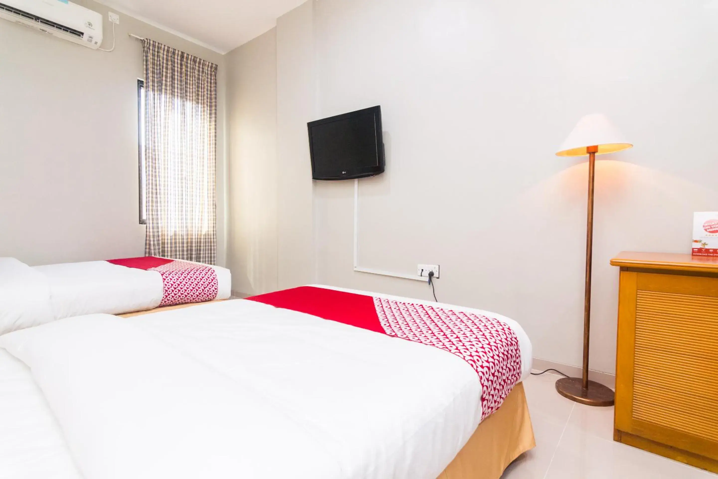 TV and multimedia, Bed in SUPER OYO 1867 Kara Guest House