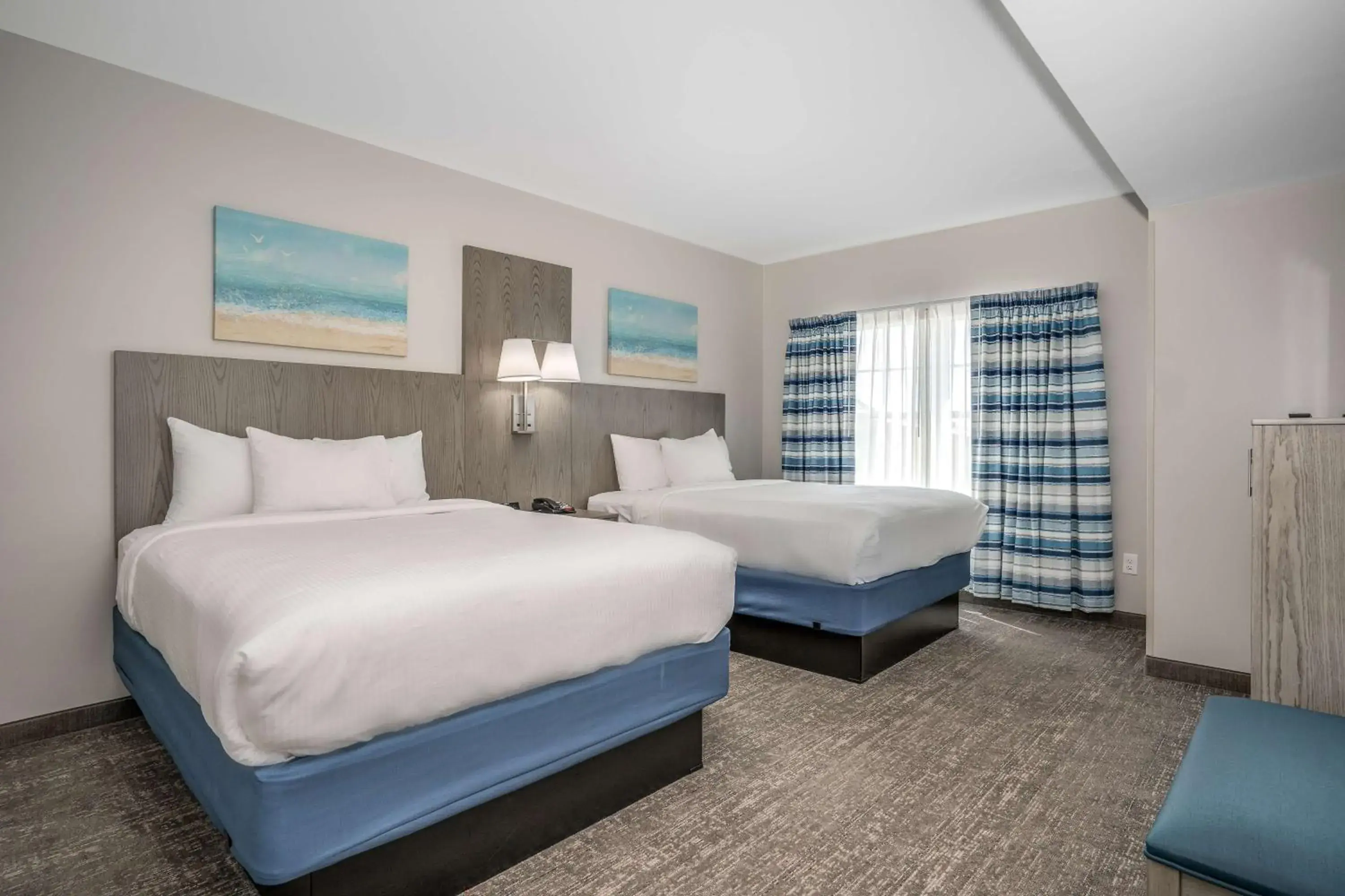 Photo of the whole room, Bed in Lighthouse Suites - Best Western Signature Collection