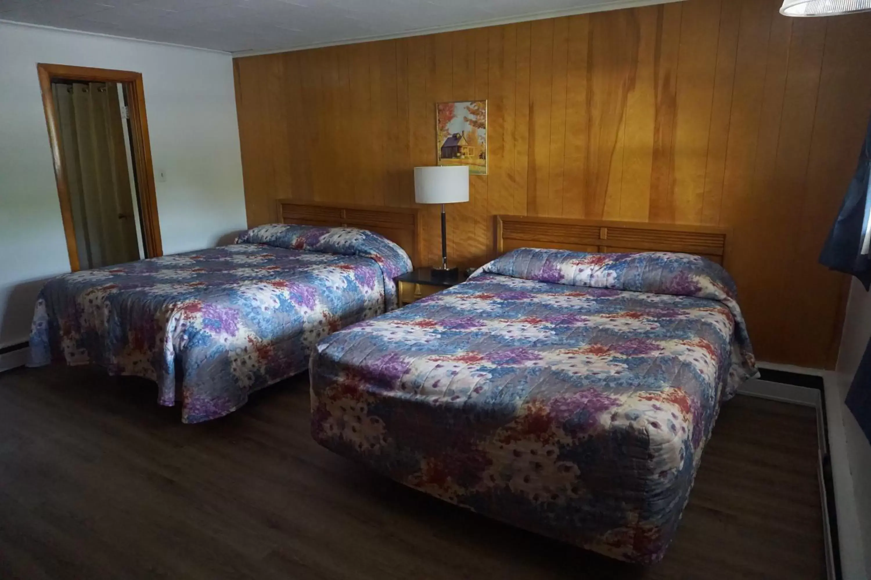 Bed in Northern Peaks Motor Inn