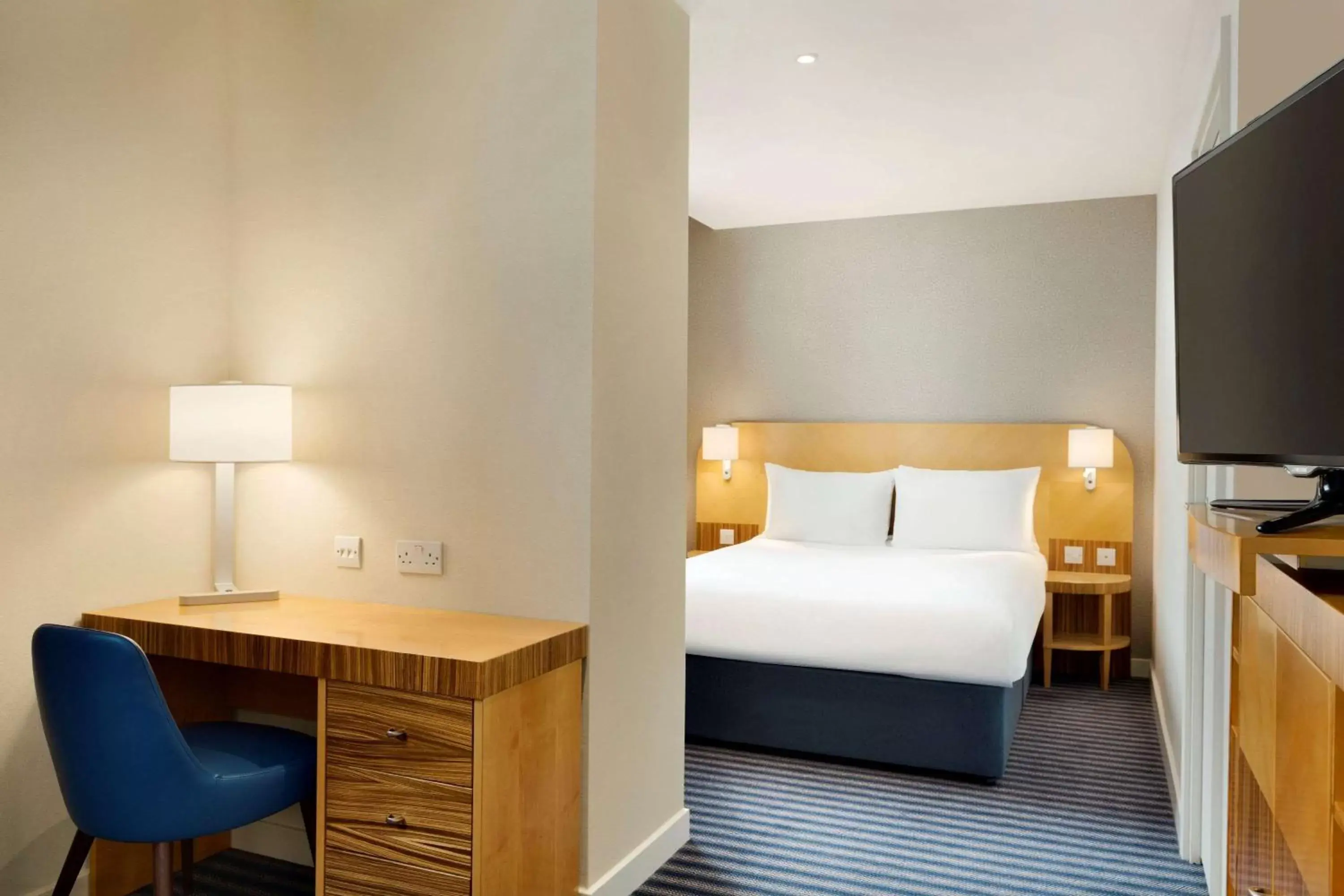 Photo of the whole room, Bed in Ramada Hotel & Suites by Wyndham Coventry