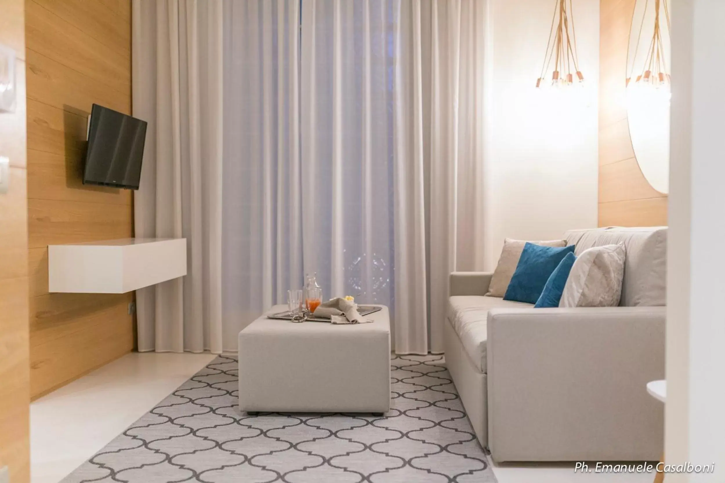 Living room, Seating Area in Metropol Ceccarini Suite