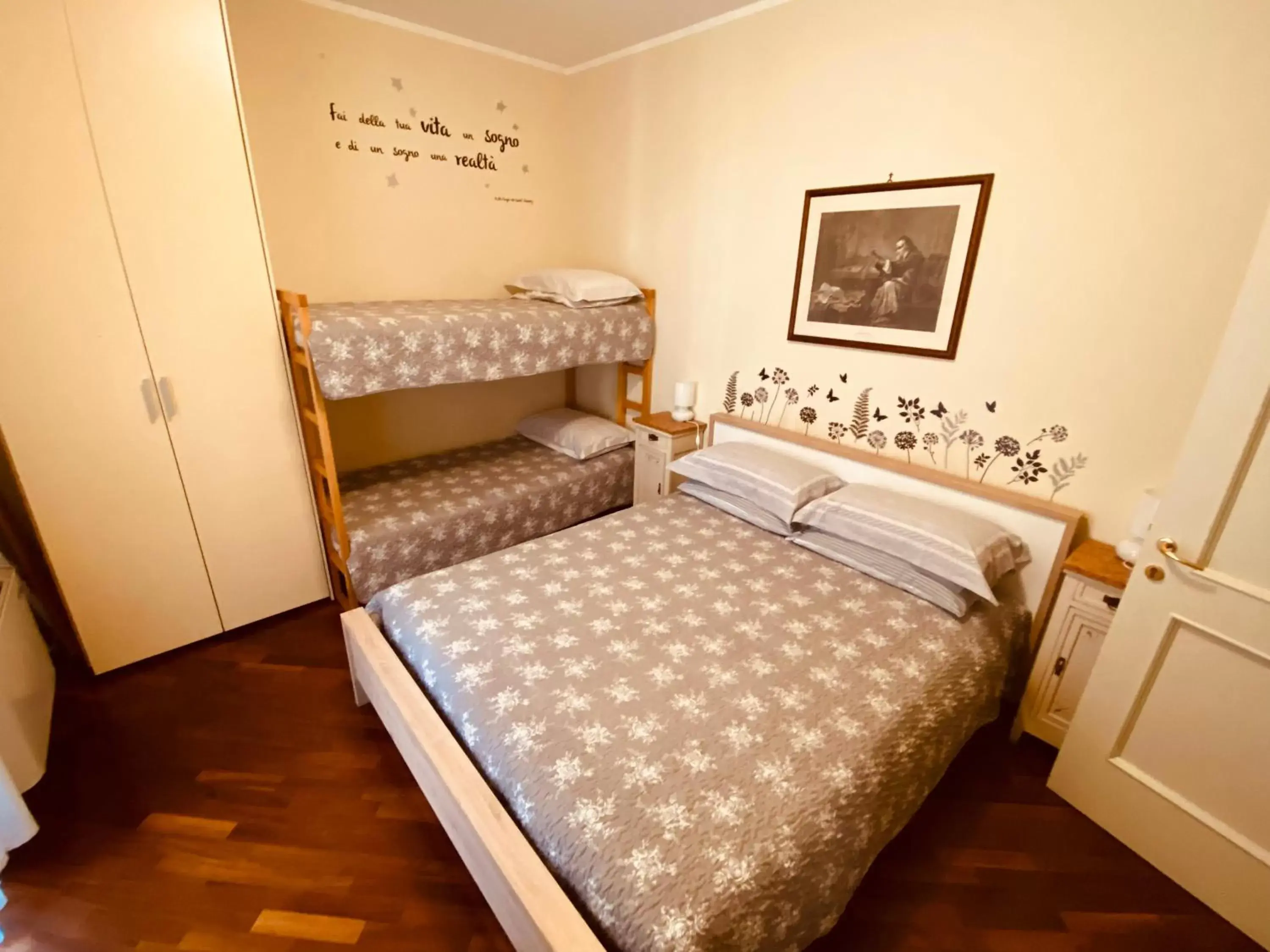 Bed in Amici Miei Rooms