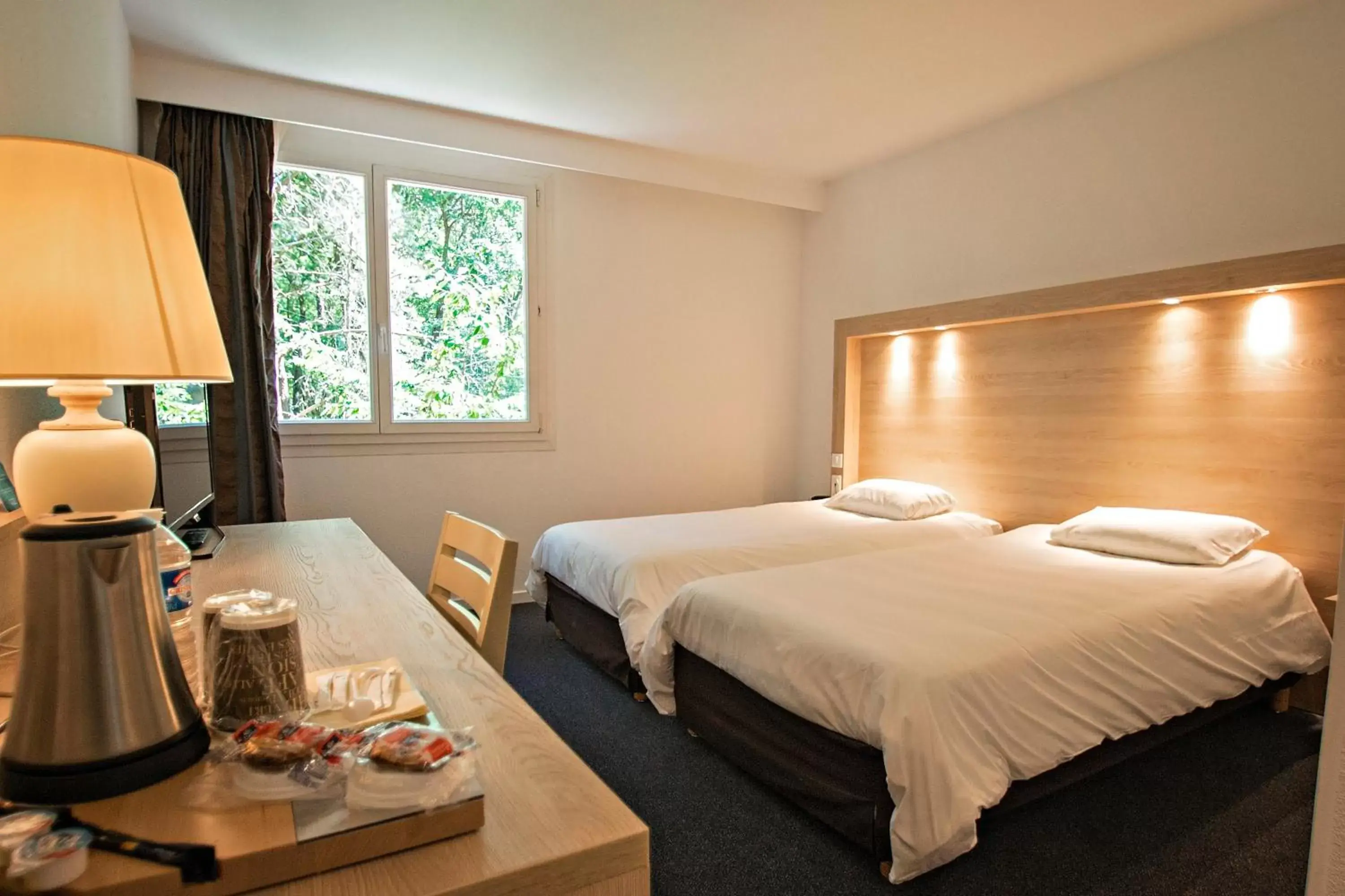 Bed in Kyriad Nemours Bed in Kyriad Nemours