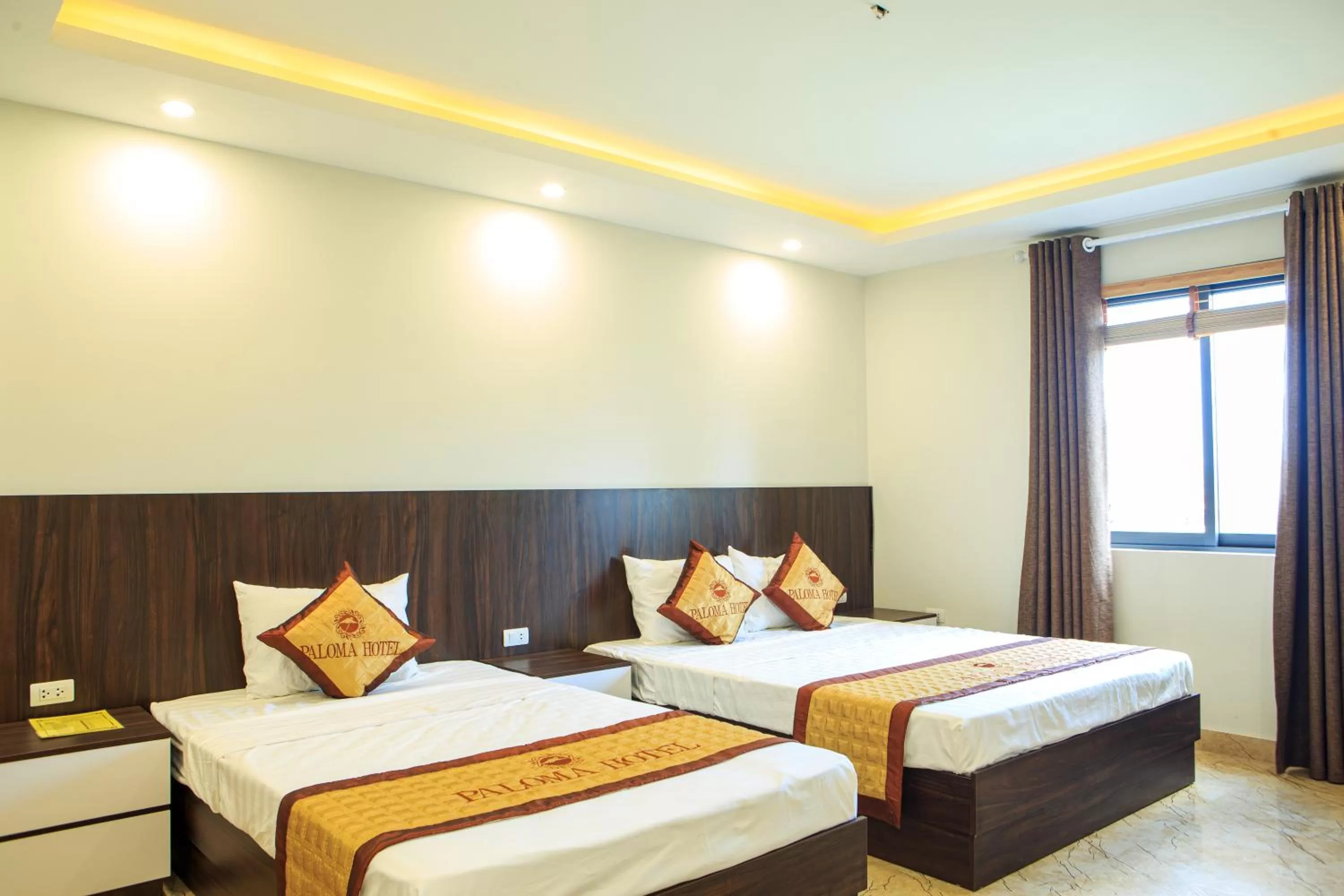 Bed in Paloma Hotel & Apartment