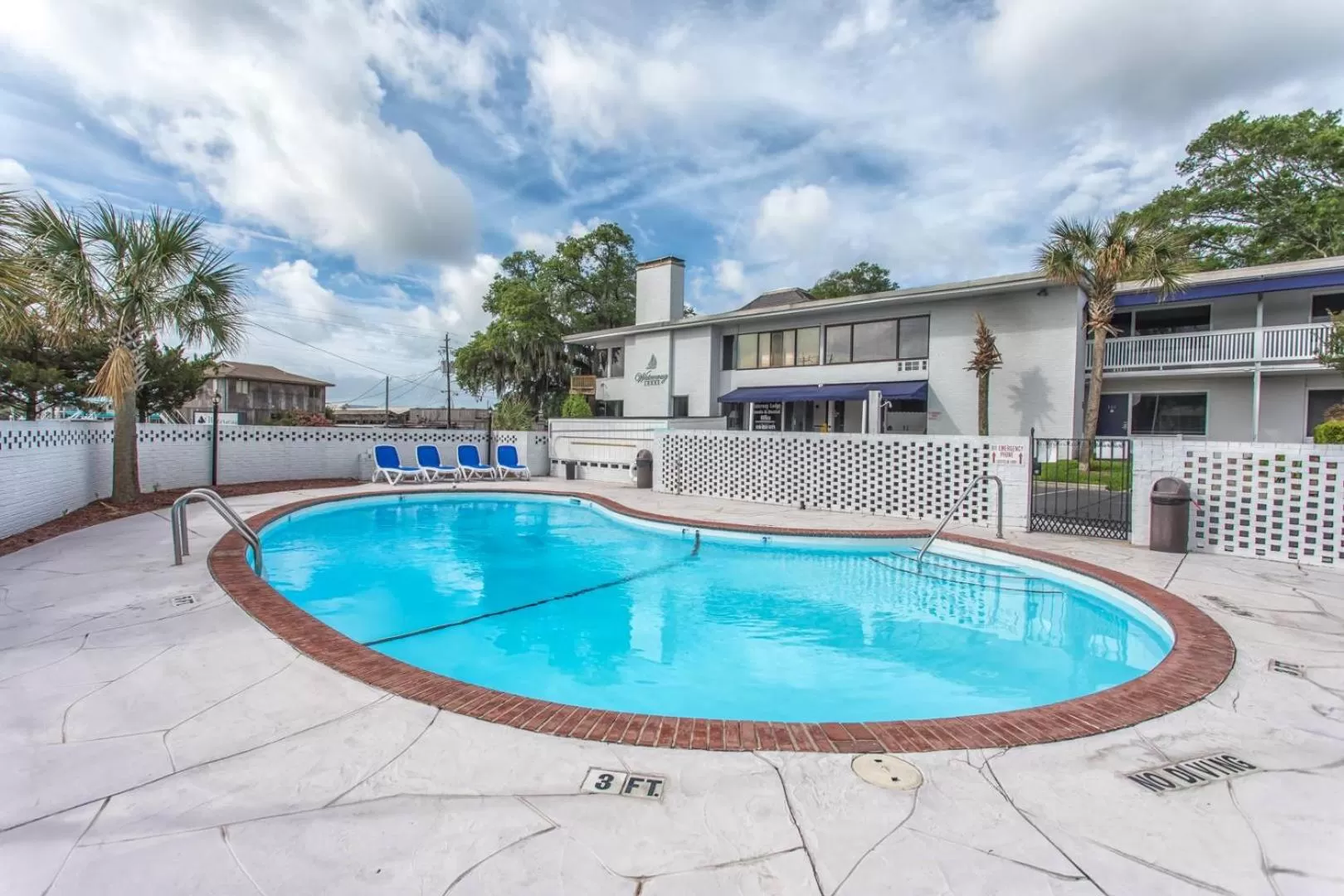 Property building, Swimming Pool in The Waterway Pet Friendly by Carolina Retreats