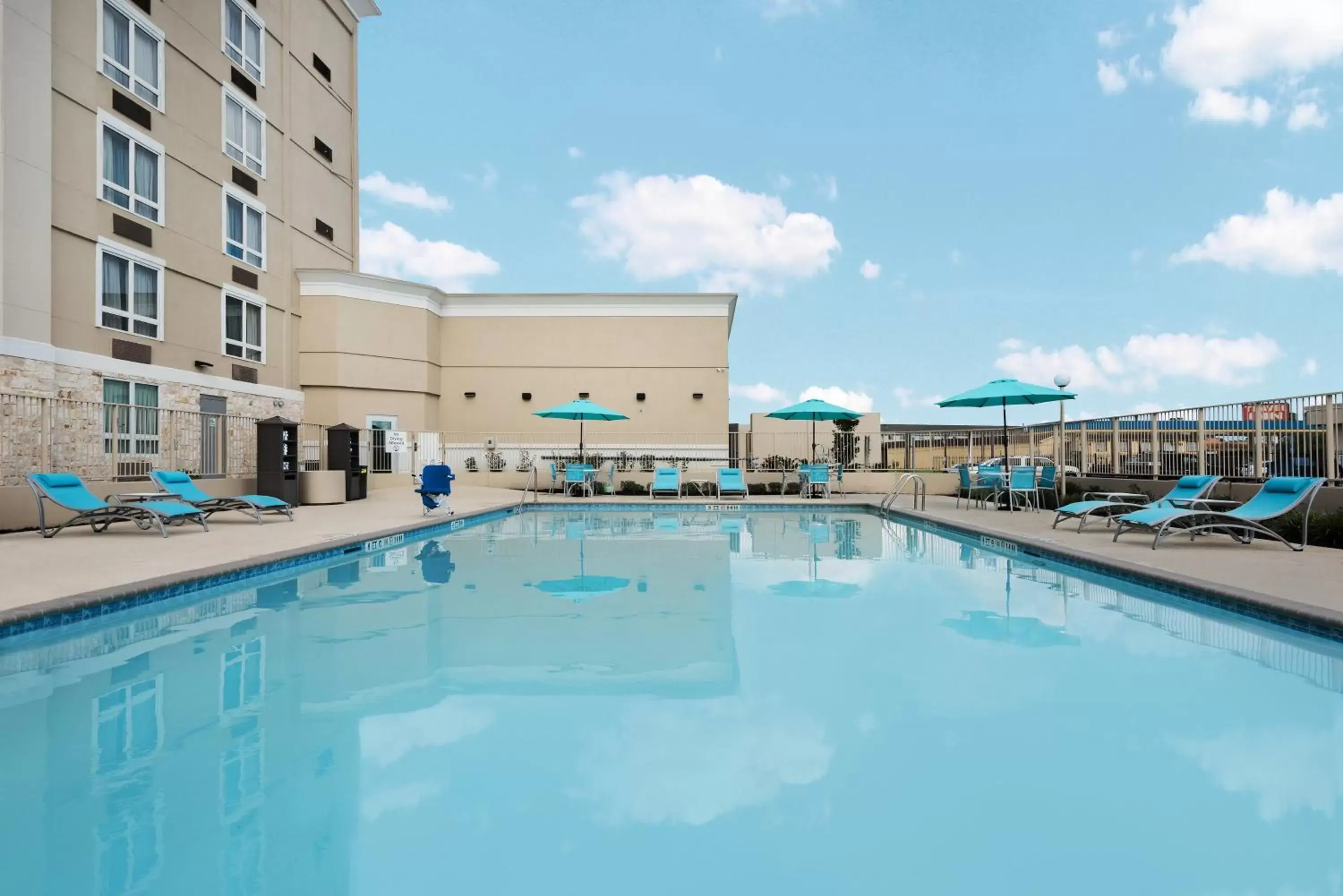Swimming Pool in Holiday Inn - Beaumont East-Medical Ctr Area, an IHG Hotel