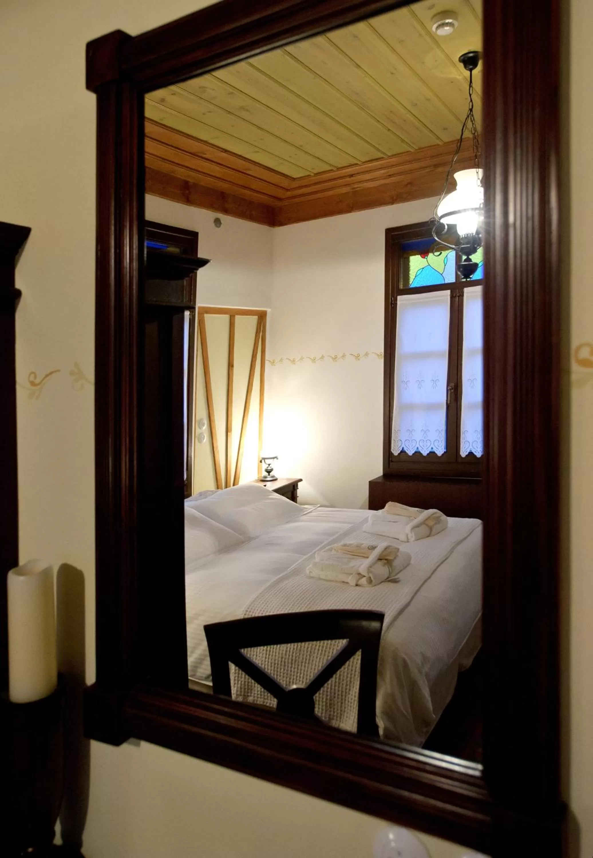 Bed in Orologopoulos Mansion Luxury Hotel