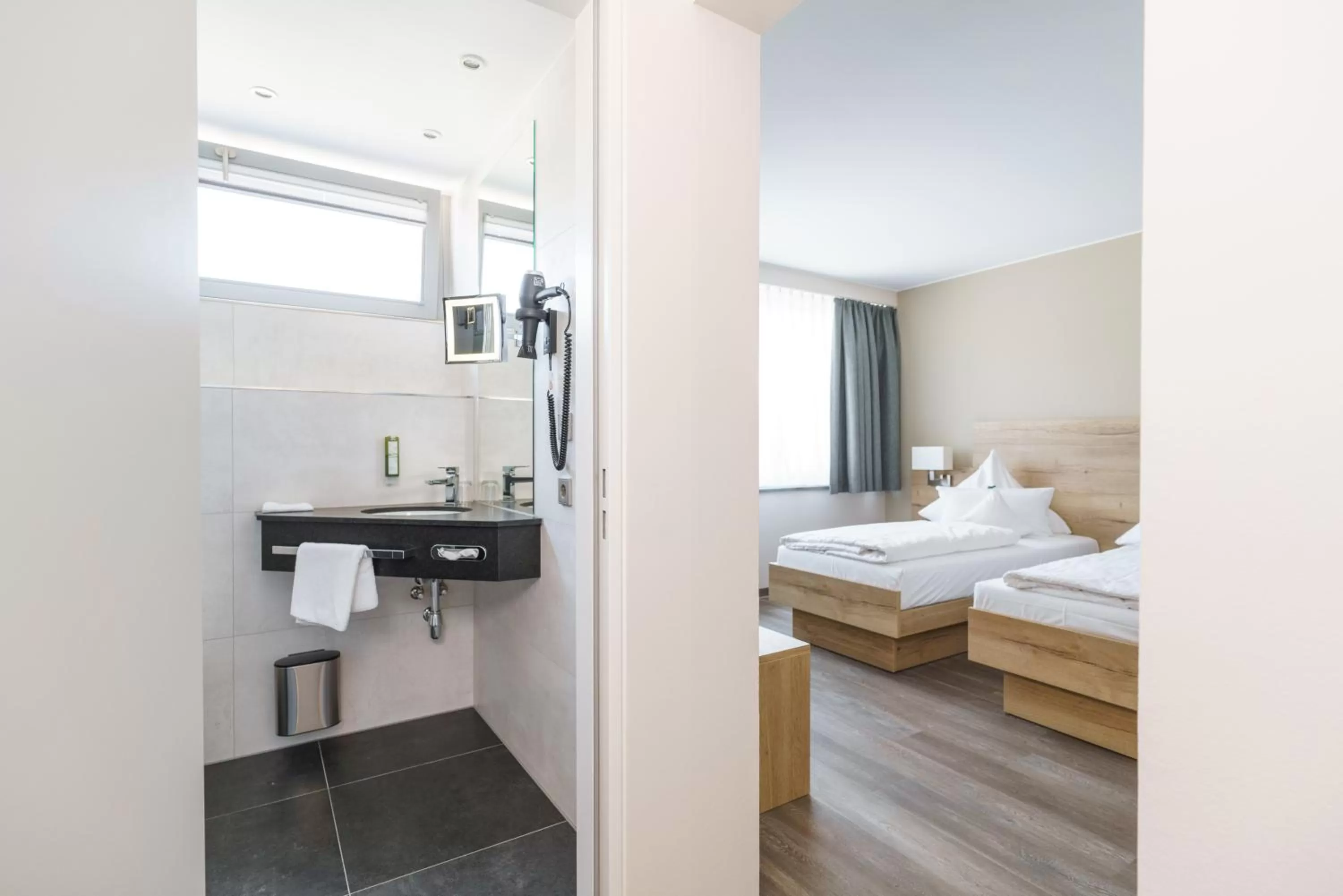 Bed in Hotel Forsthaus Grüna Betreibergesellschaft mbH