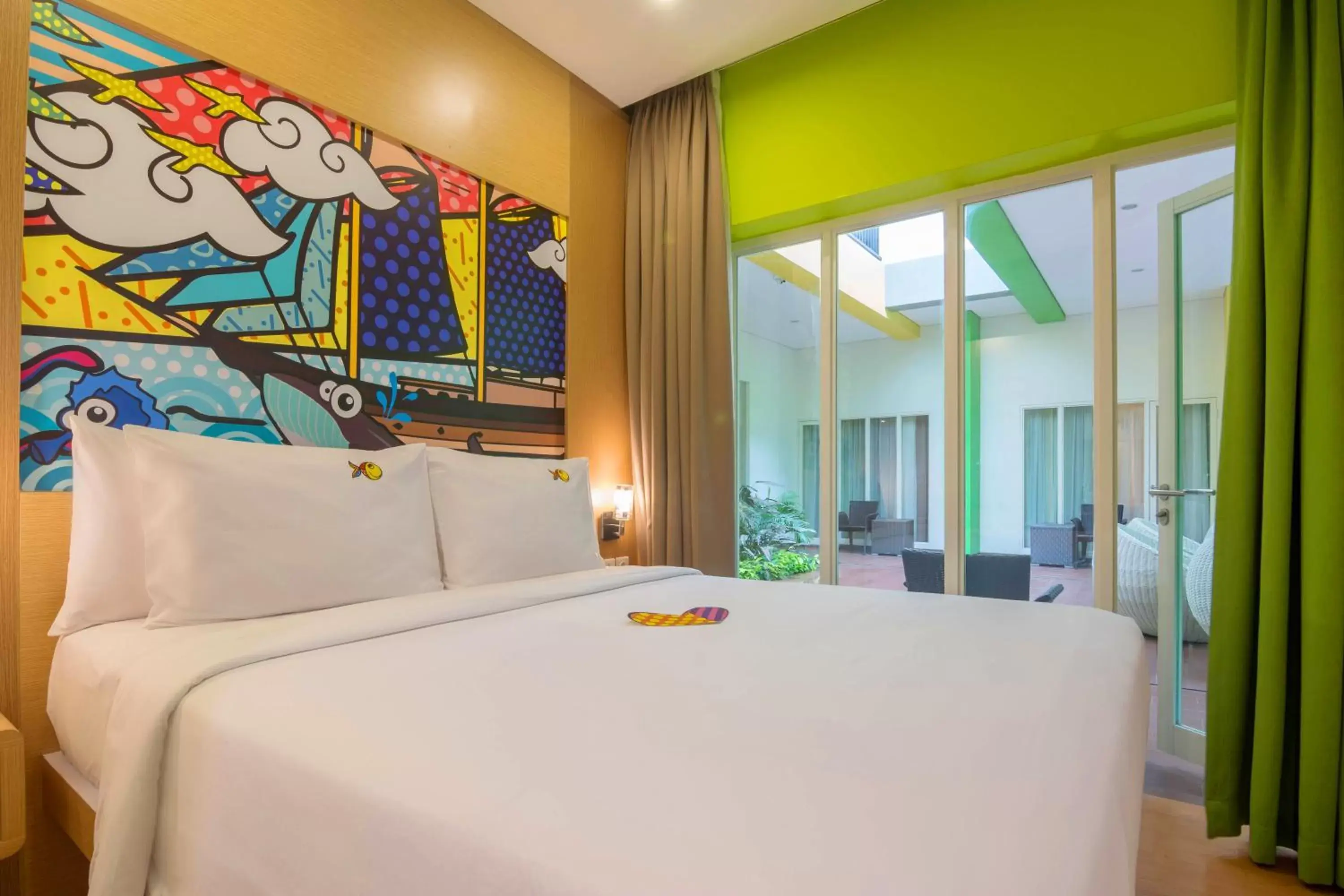 Bed in MaxOneHotels at Resort Makassar