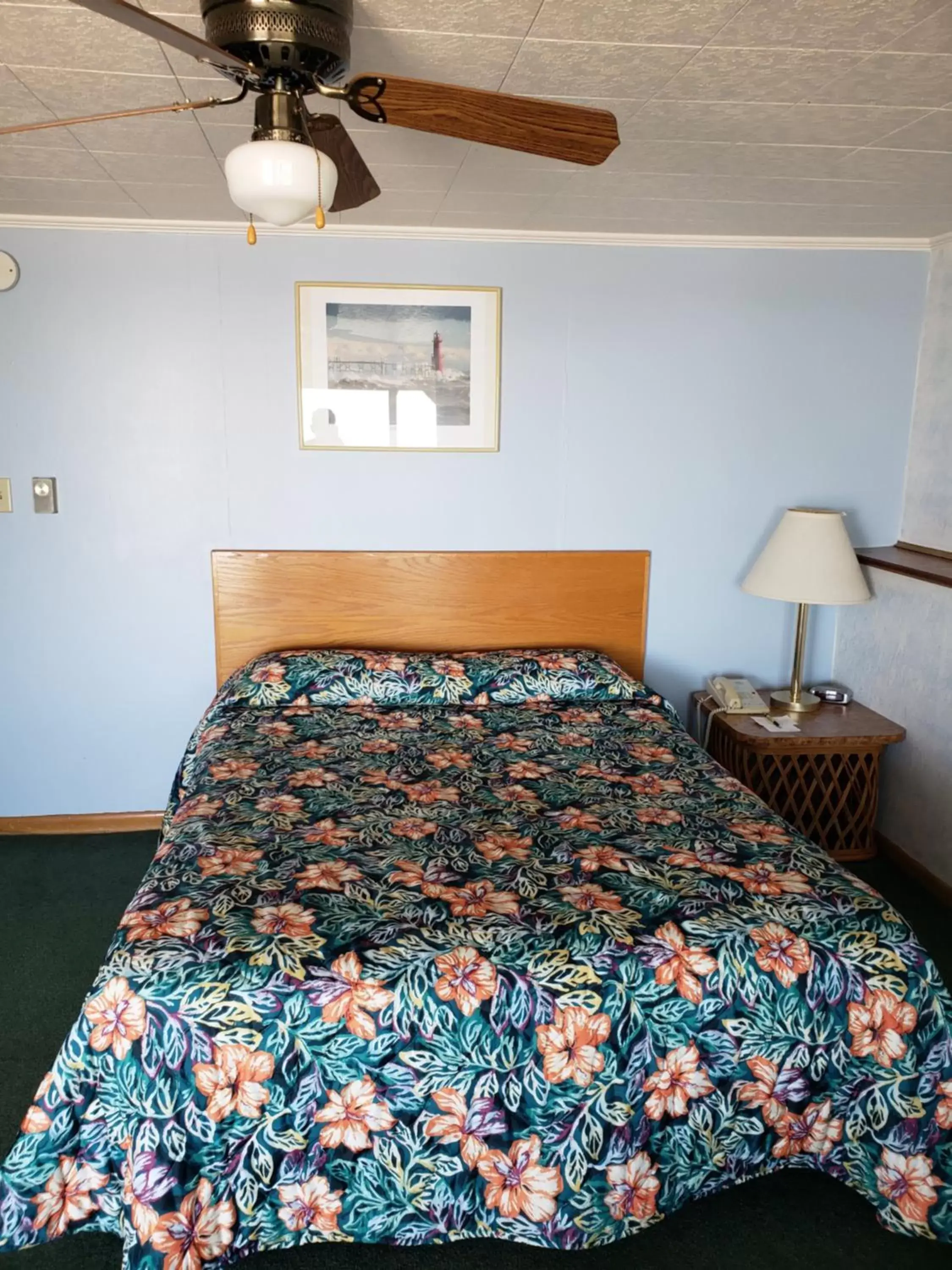Bed in Algoma Beach Motel