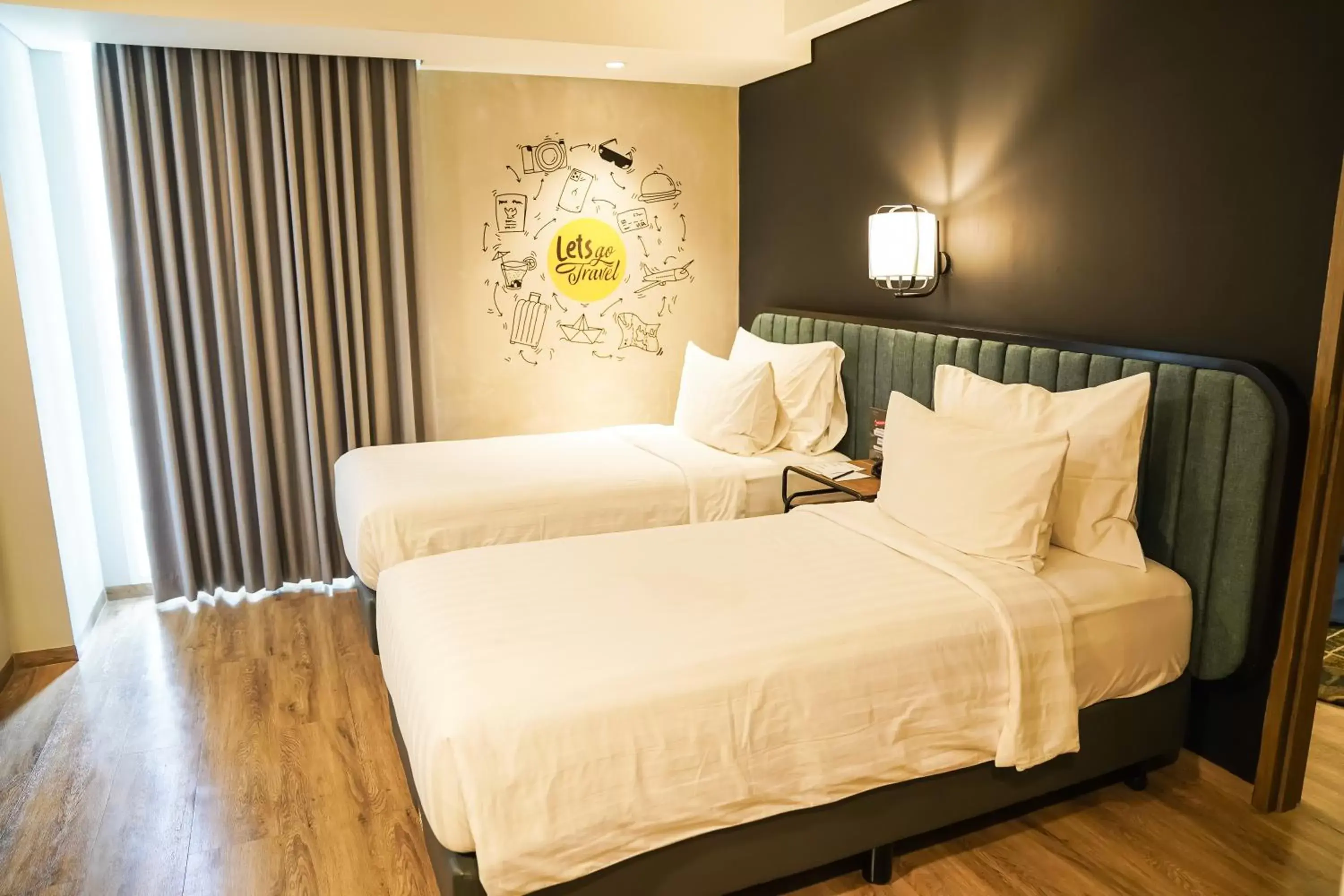 Bedroom in Luminor Hotel Purwokerto By WH