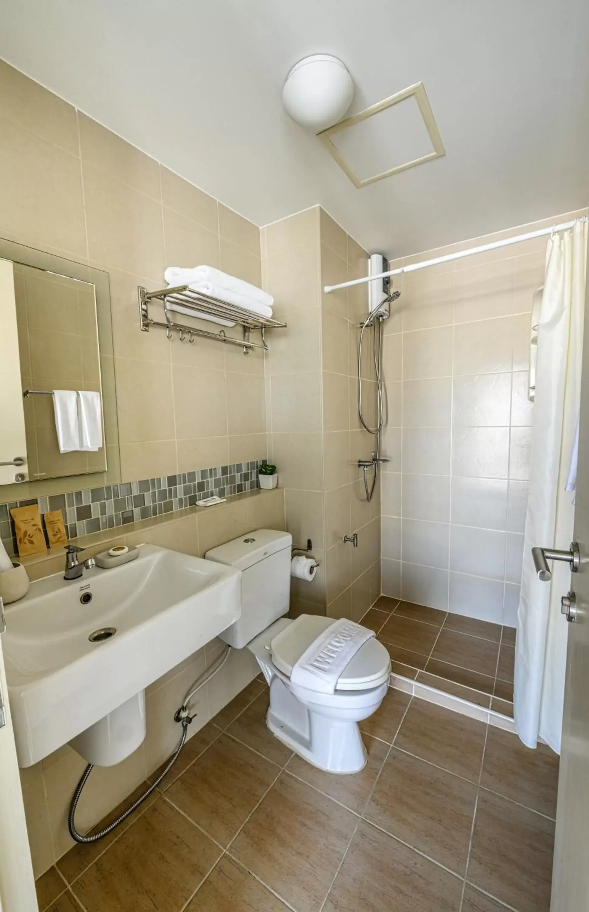 Bathroom in First Choice Suites SHA Plus Extra