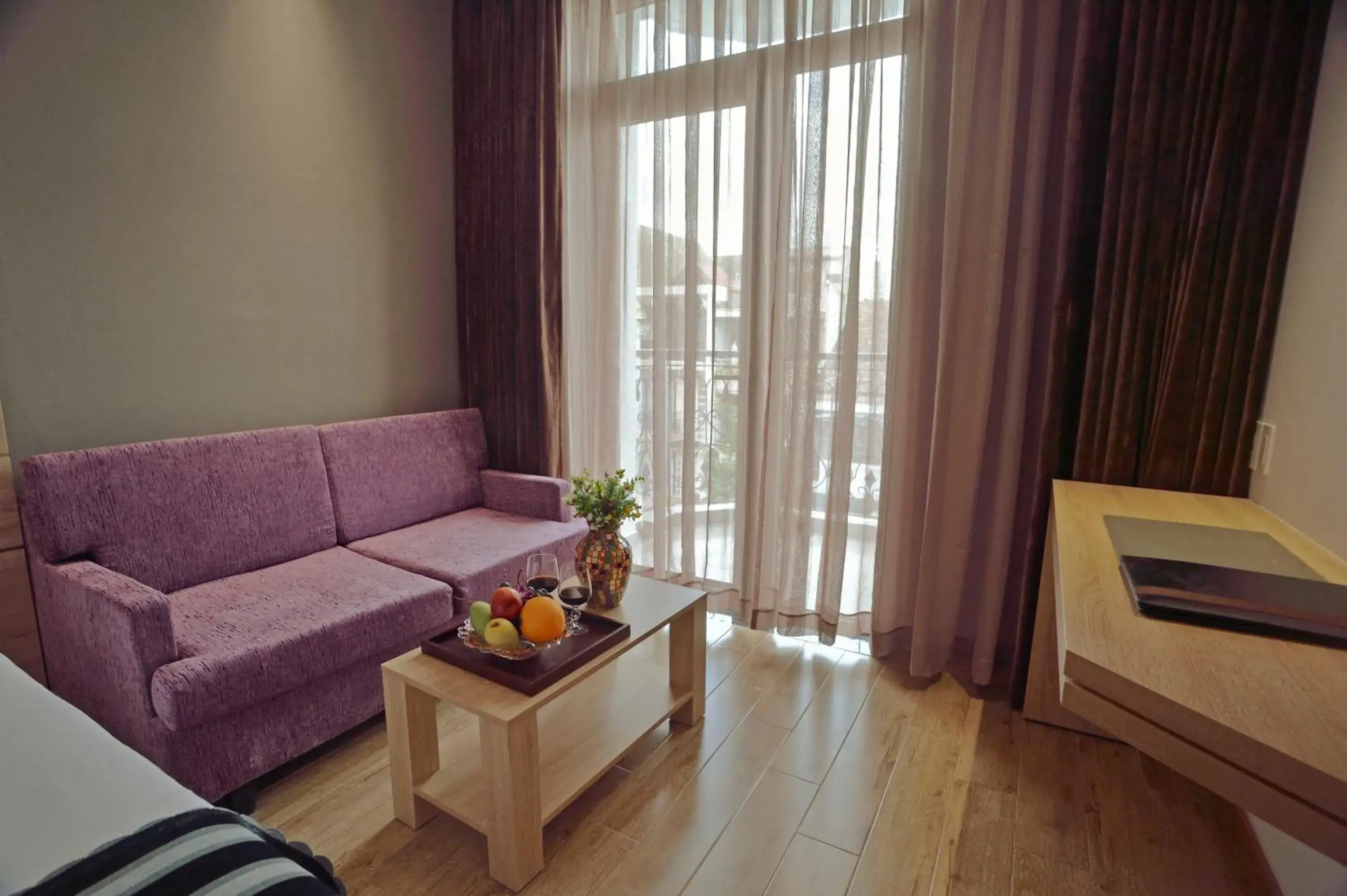 Bedroom, Seating Area in Aiden Saigon Hotel