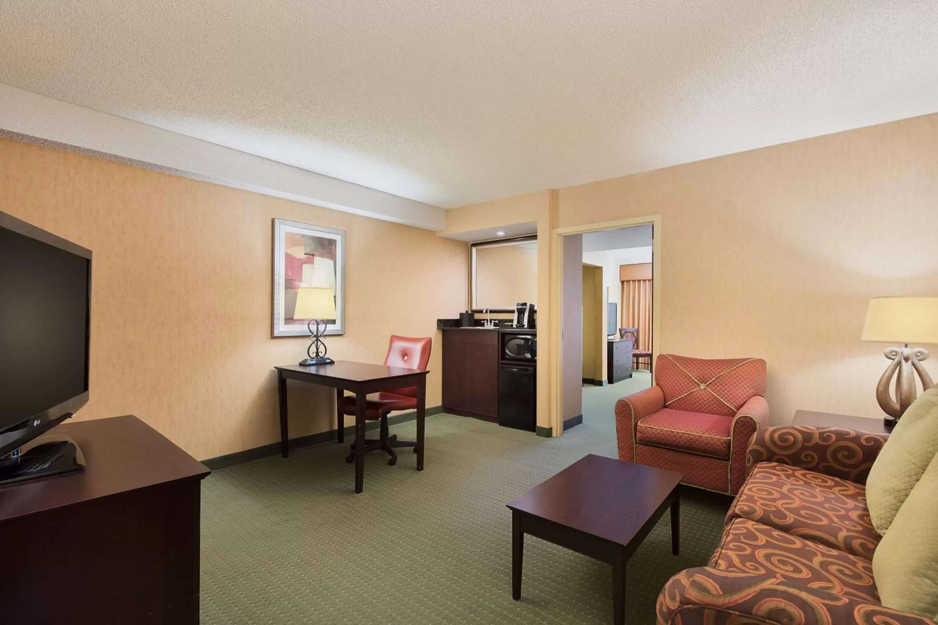 Bedroom, Seating Area in University Plaza Hotel