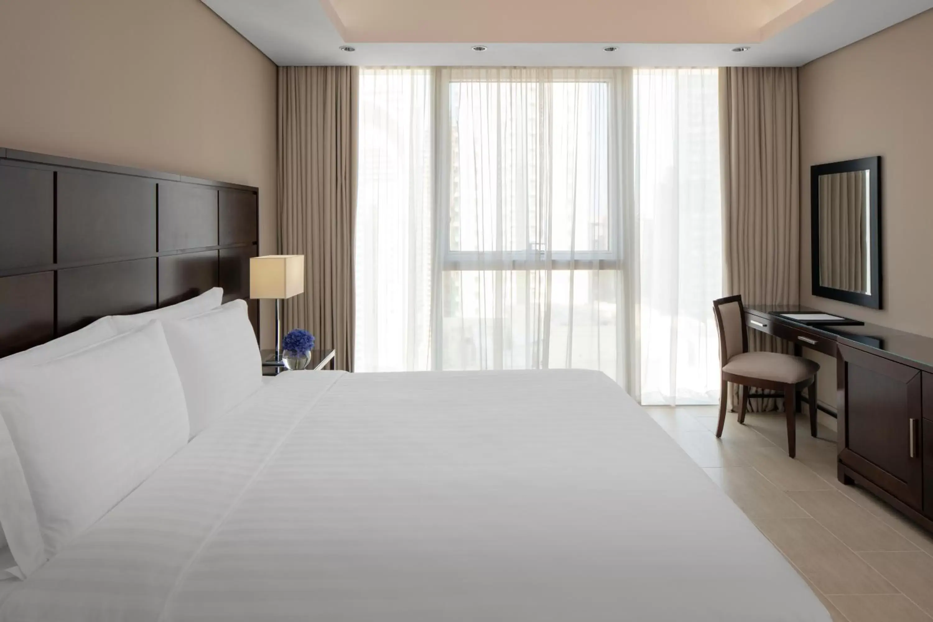 Bed in Dusit Doha Hotel