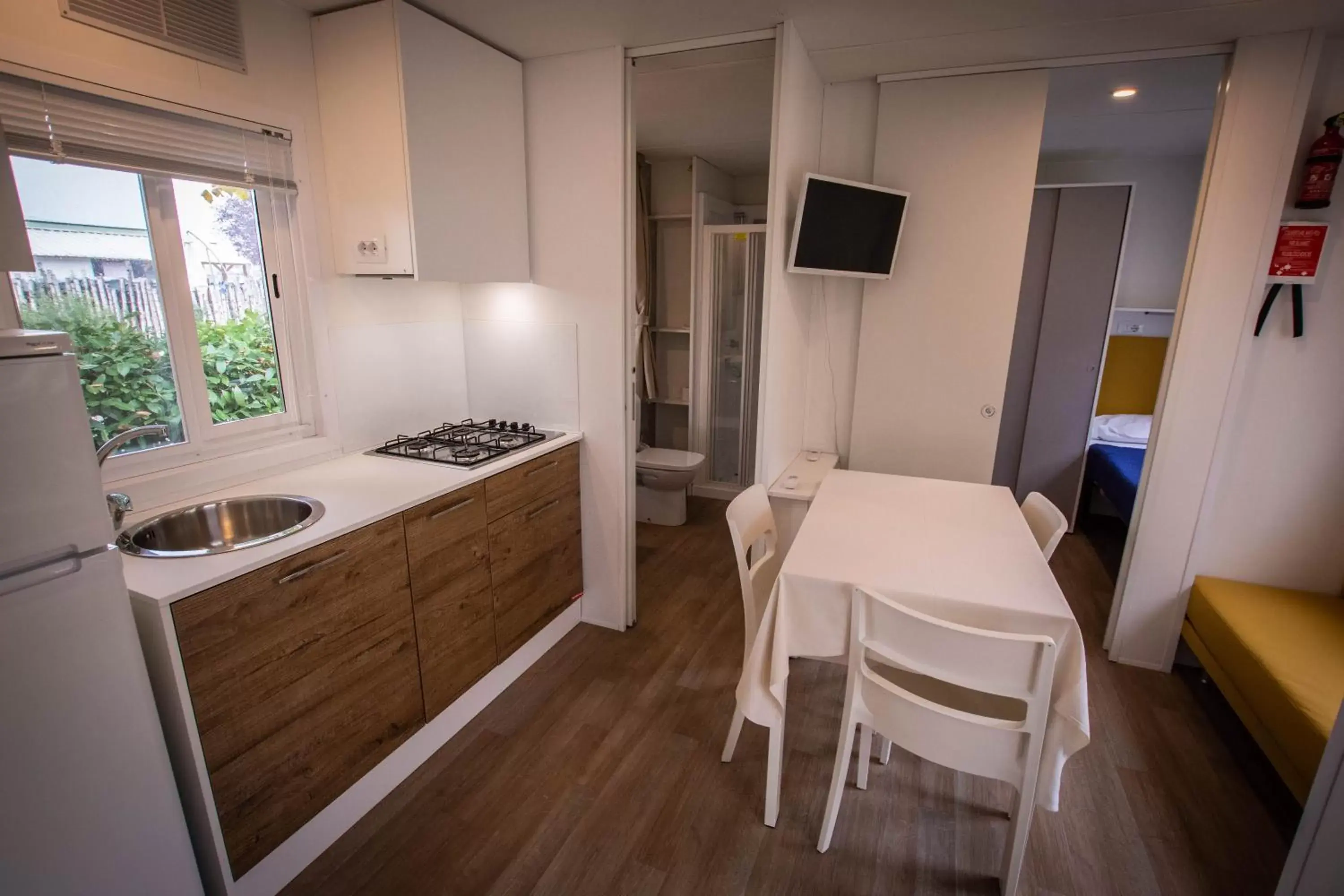 Kitchen/Kitchenette in AgriCamping AlbaVillage Hotel & Wellness