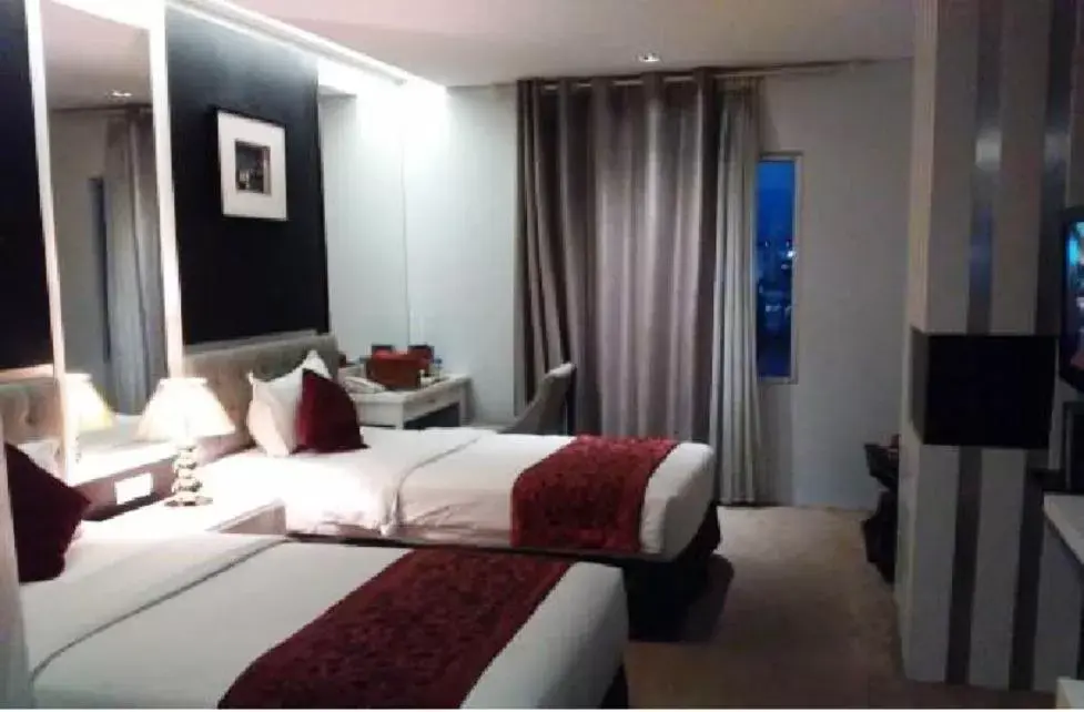 Photo of the whole room, Bed in Gino Feruci Braga by KAGUM Hotels