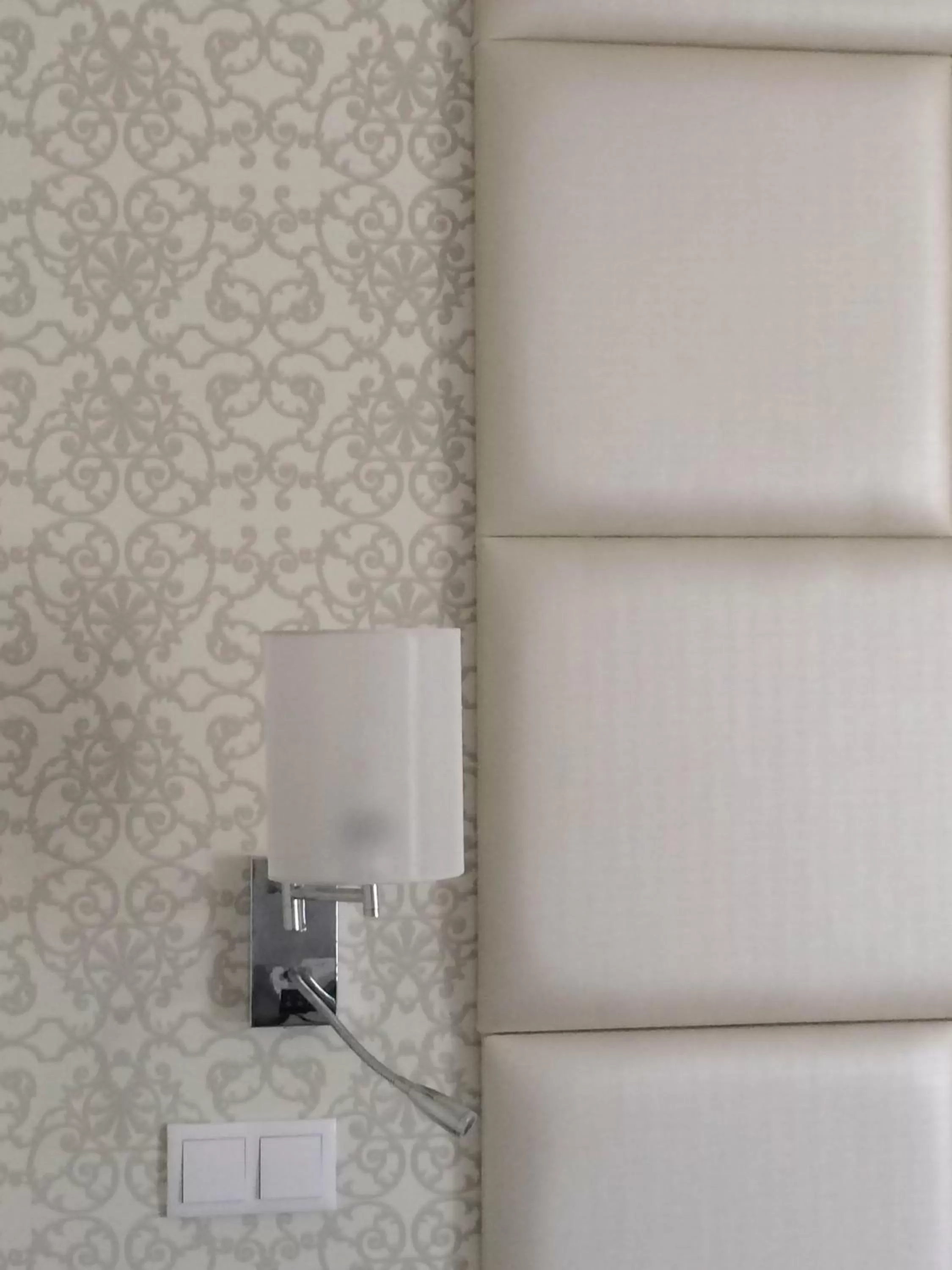 Bed in Josefa D`Obidos Hotel