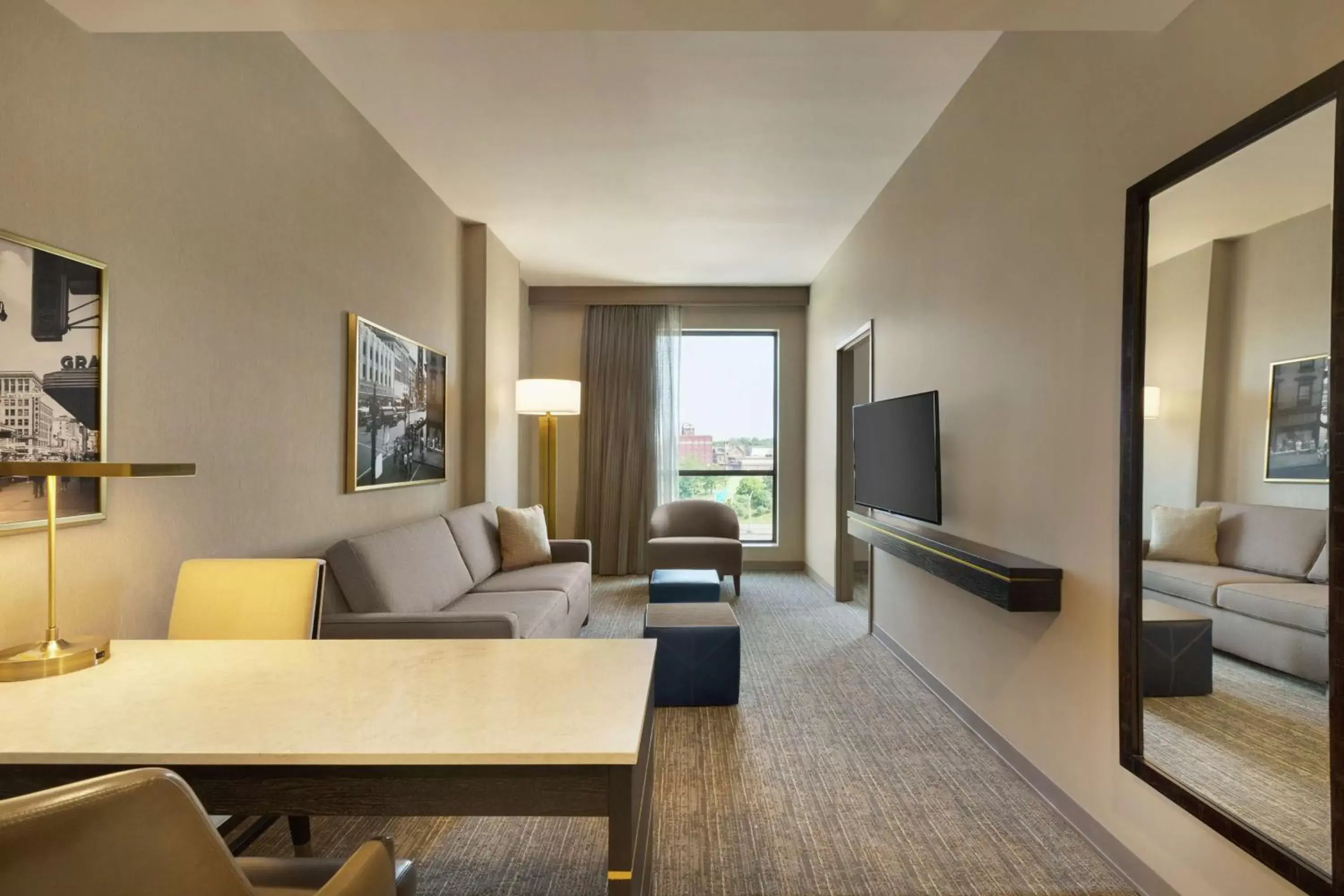 Bedroom, Seating Area in Embassy Suites By Hilton Syracuse Destiny USA