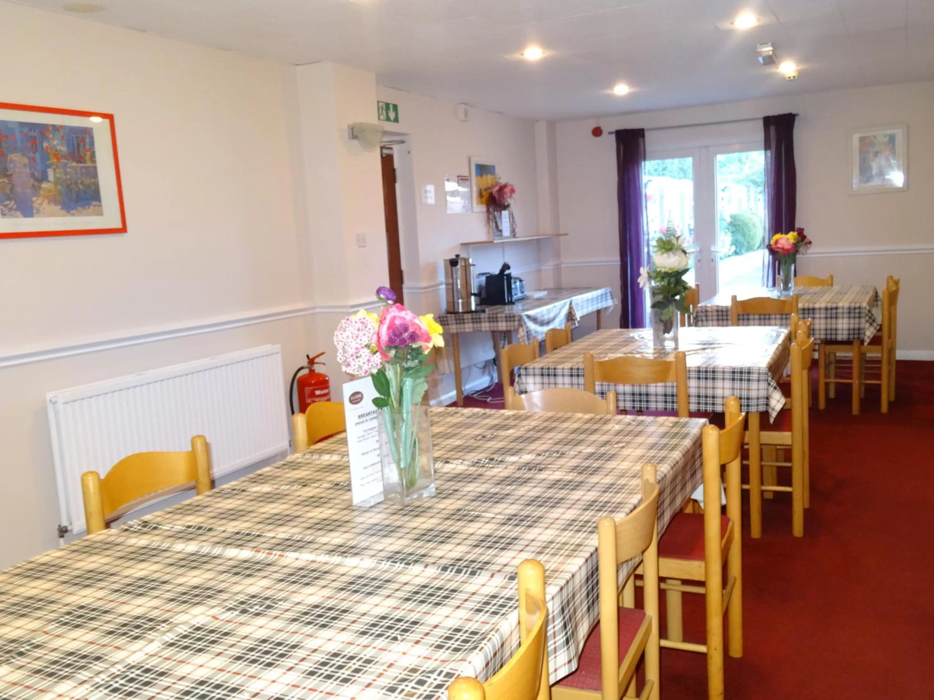 Dining area in AJ Lodge