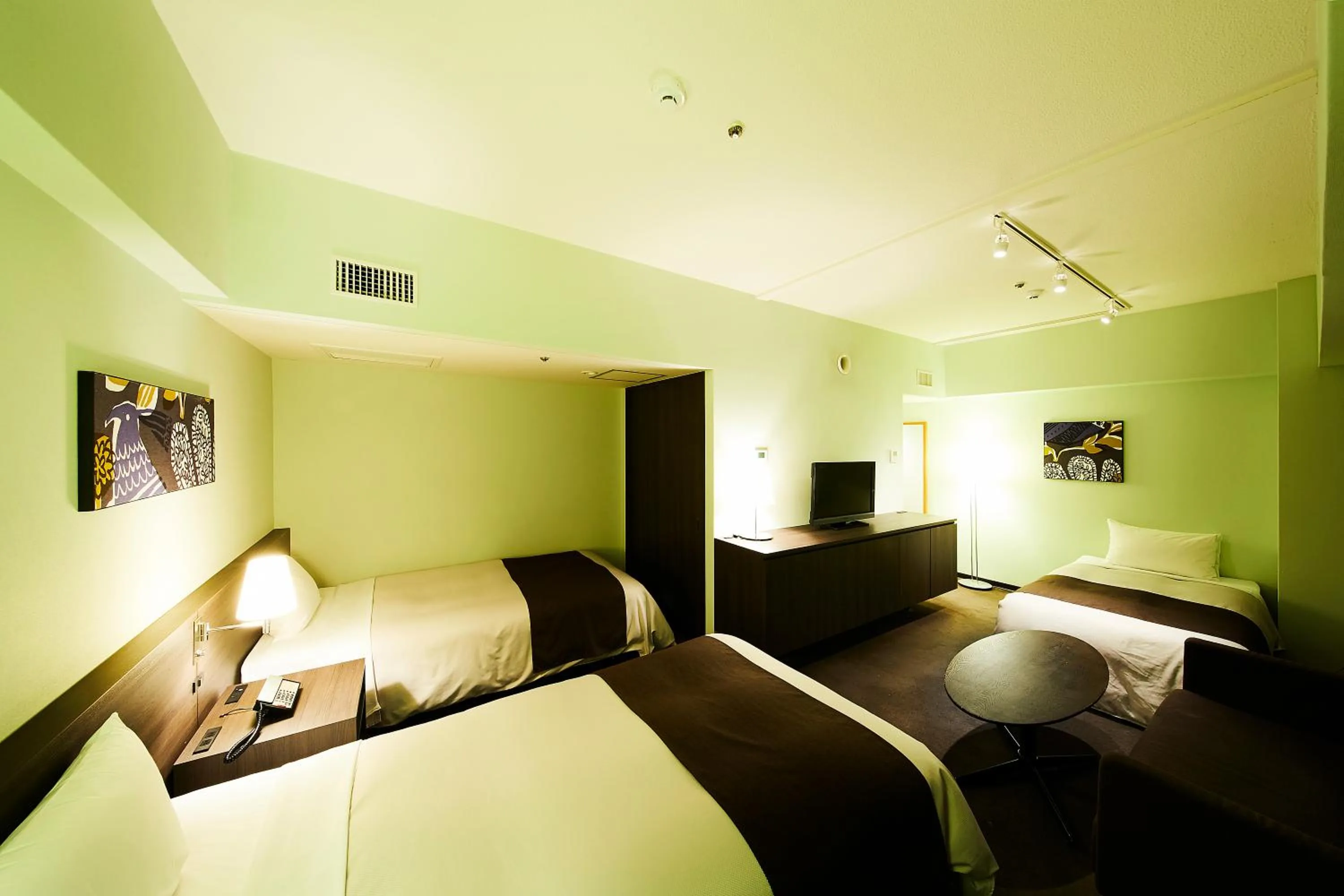 Bed in Ginza Grand Hotel