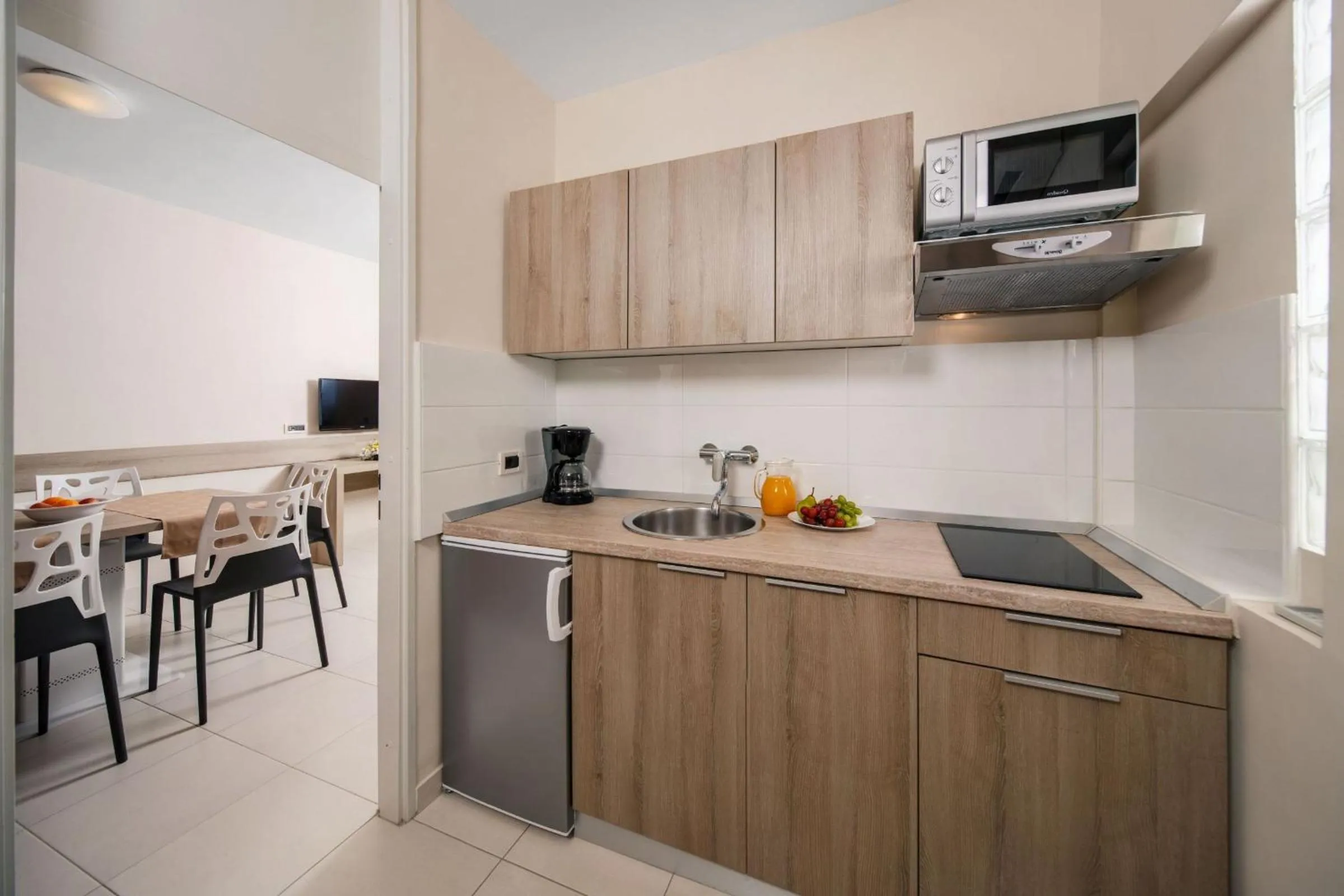 Kitchen or kitchenette in Apartments Katoro Plava Laguna
