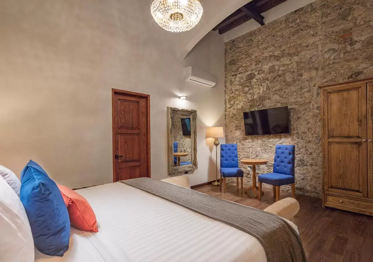 Bed in Hotel Casa Monarca