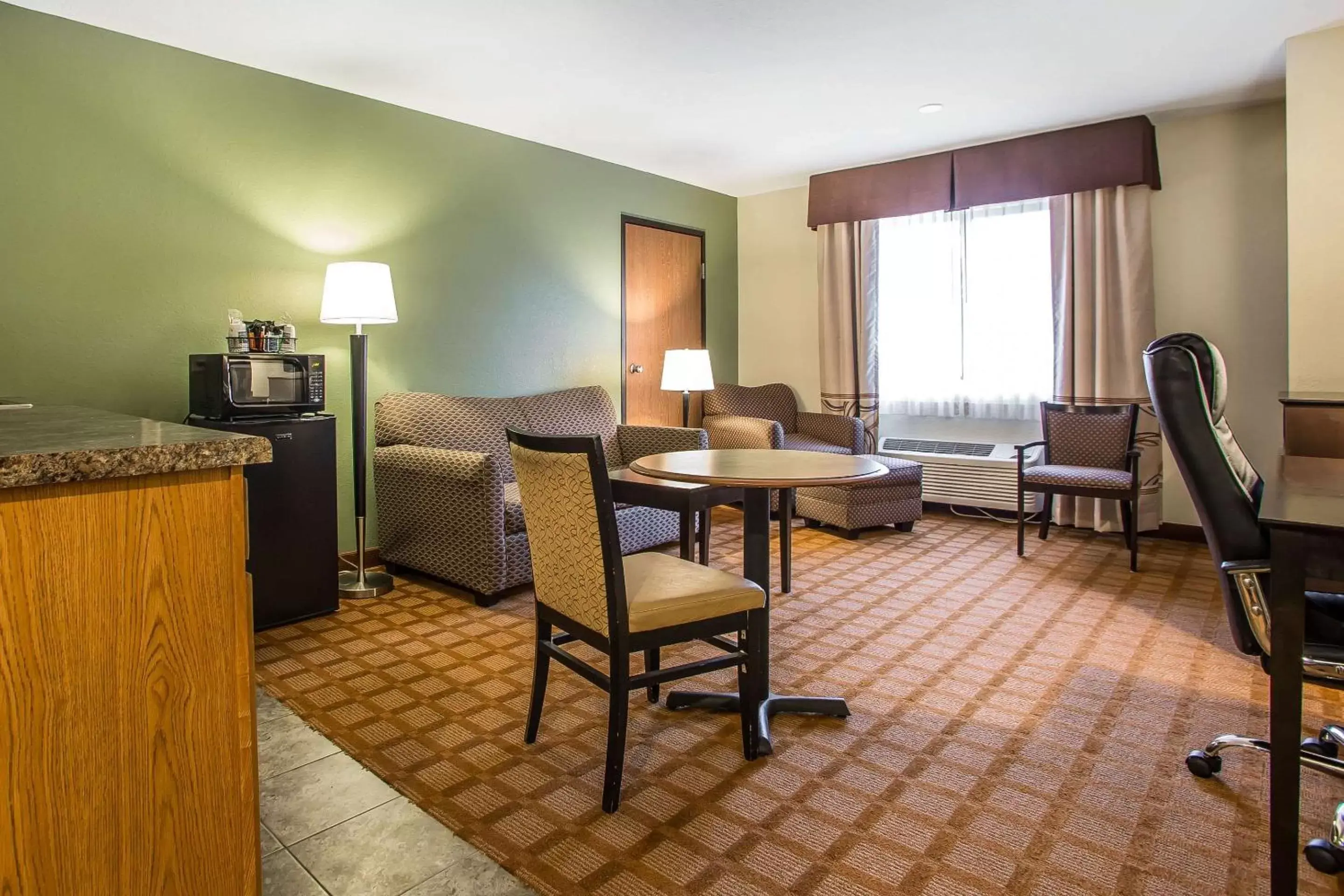 Photo of the whole room, Seating Area in Quality Inn & Suites Marinette