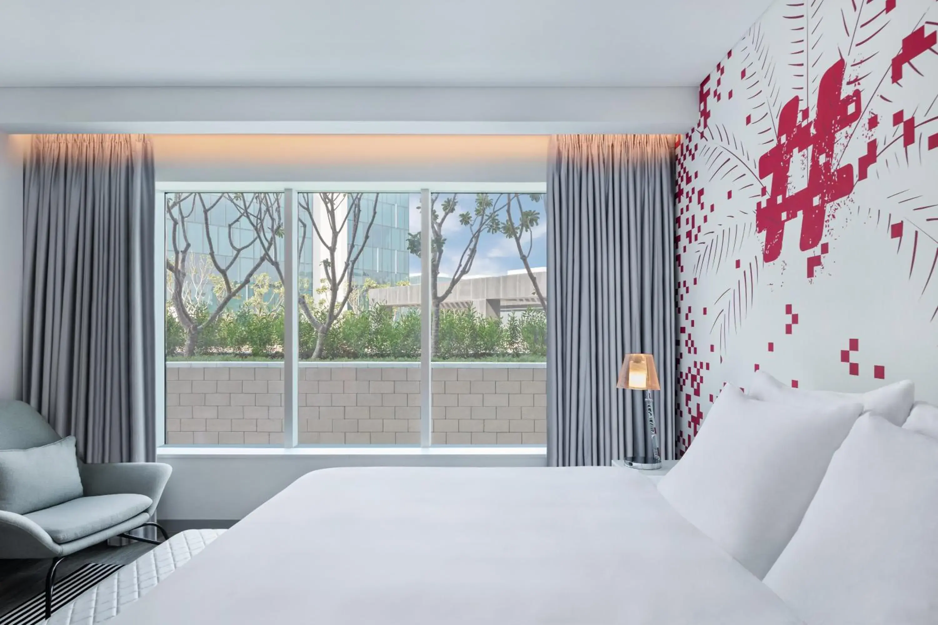 Bed in Radisson RED Dubai Silicon Oasis