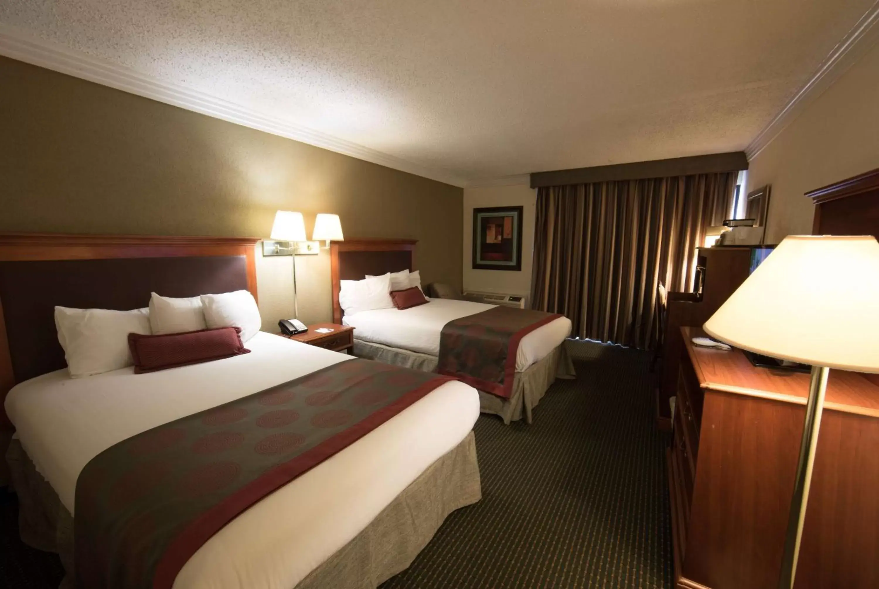 Photo of the whole room, Bed in Ramada by Wyndham Houston Intercontinental Airport East