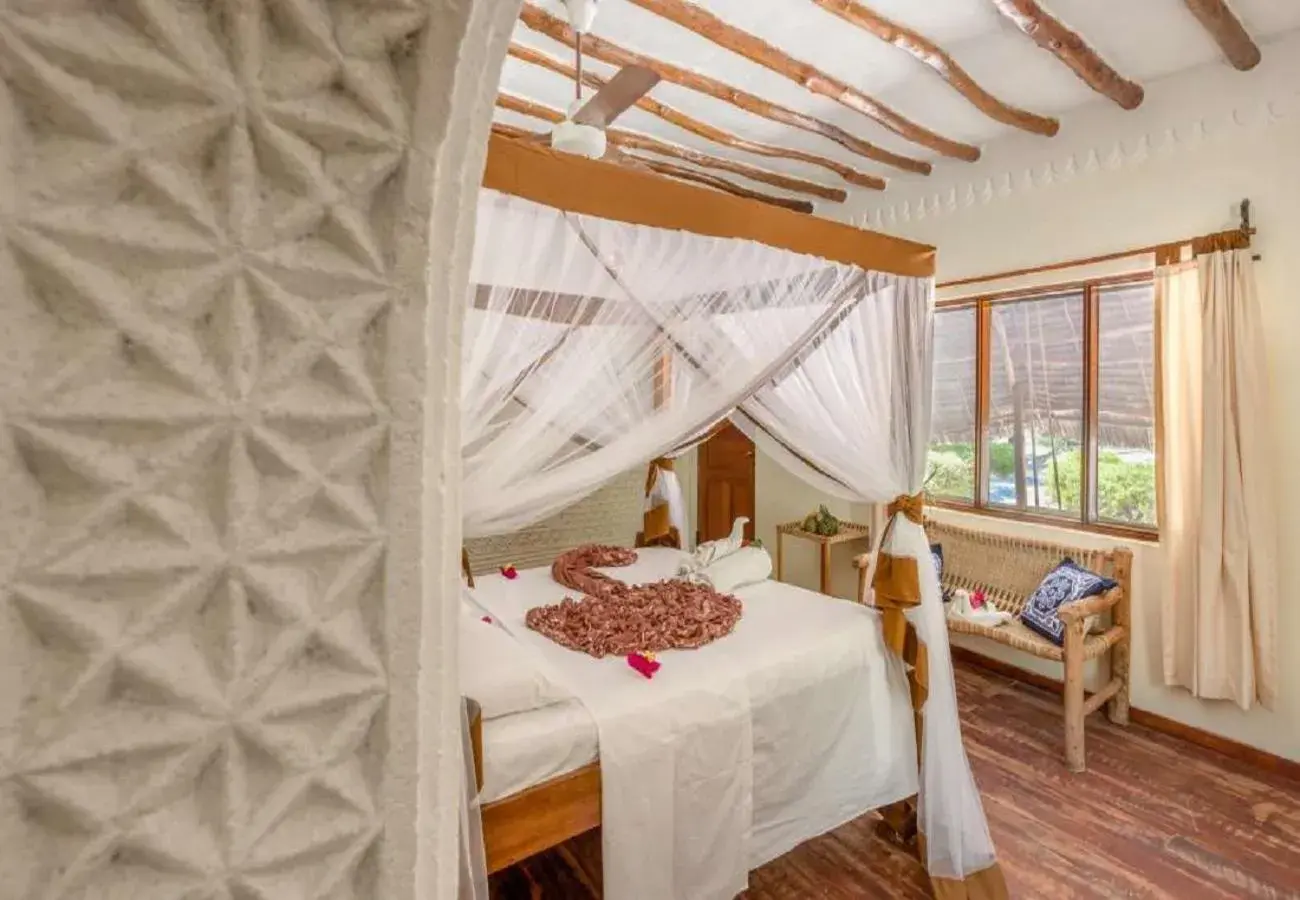 Bedroom, Bed in Hakuna Majiwe Beach Lodge Zanzibar