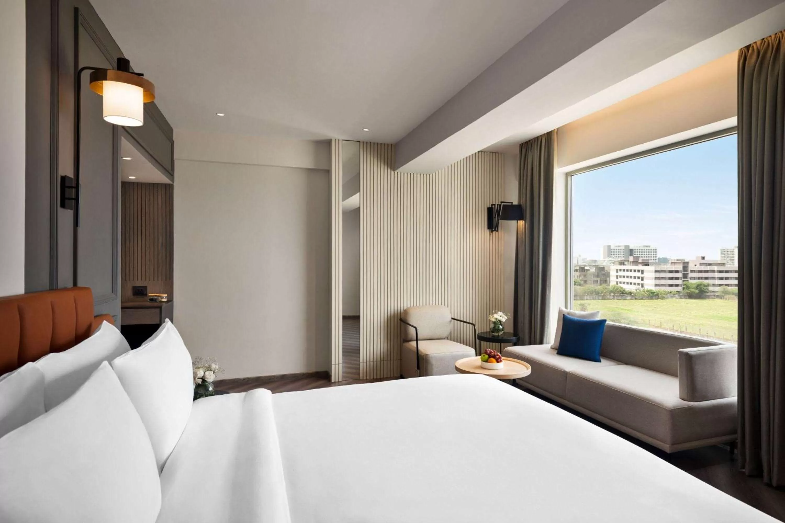 Bed in Ramada Encore by Wyndham Indore Nipania