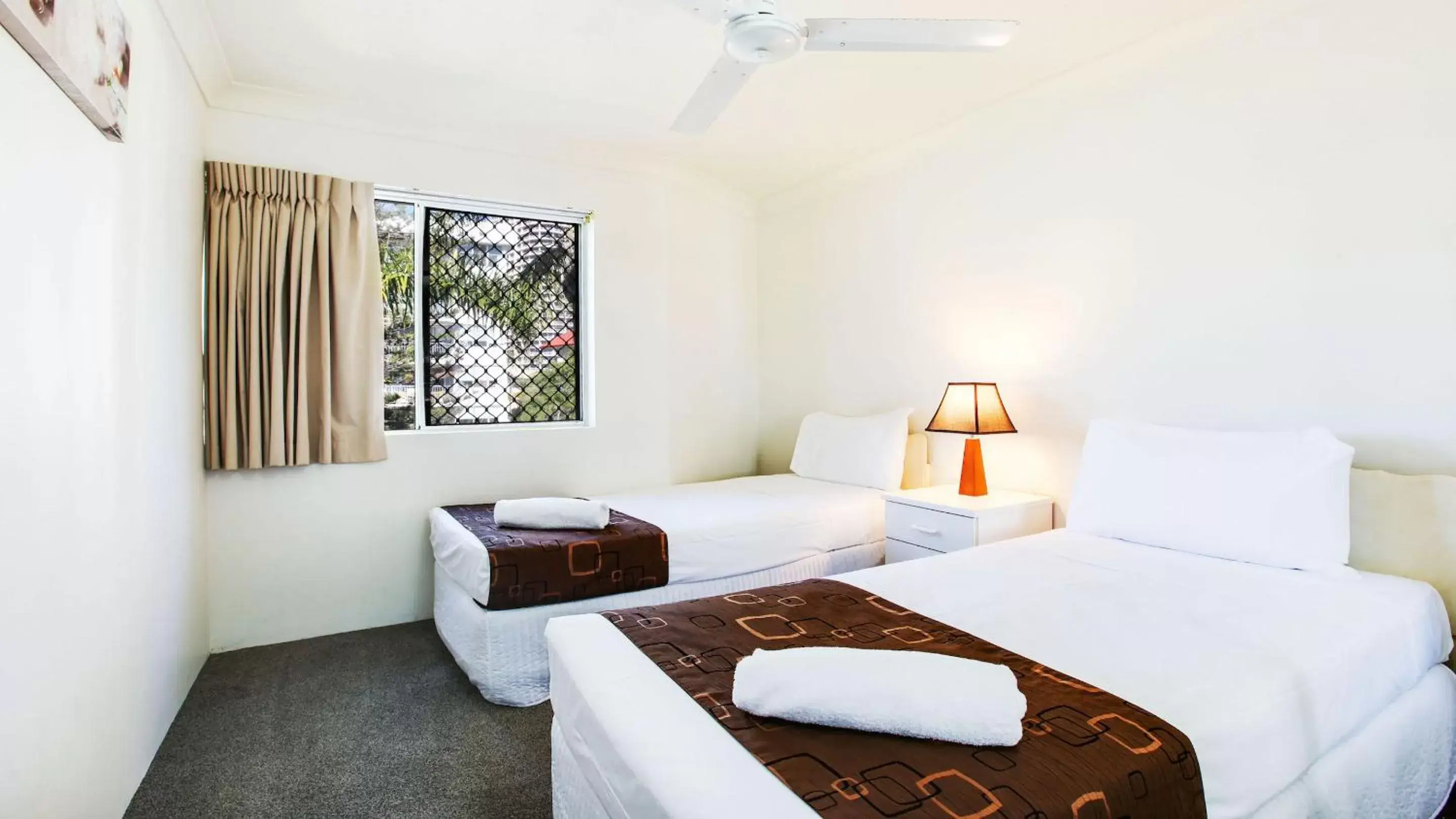 Bed in Mari Court Resort