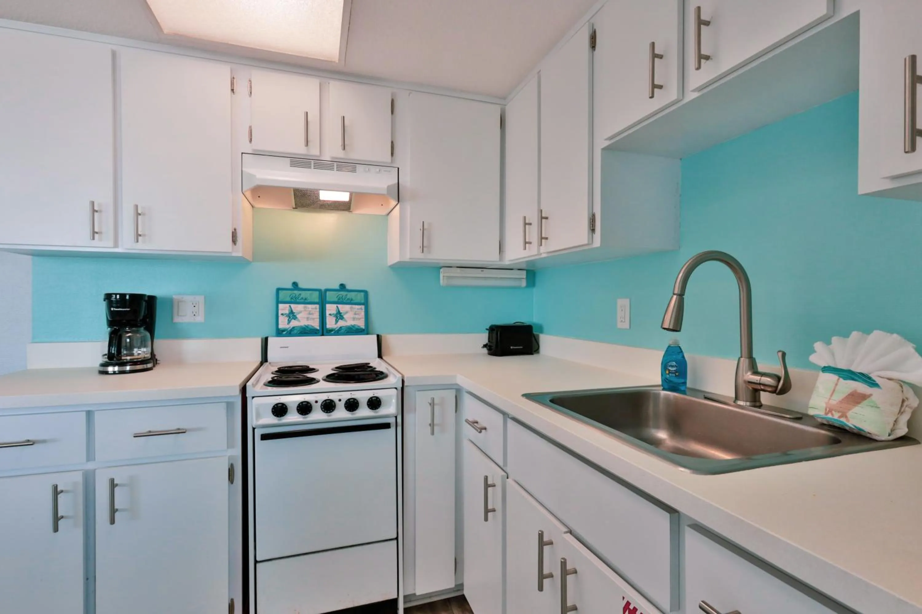 Kitchen or kitchenette in Coastal Waters