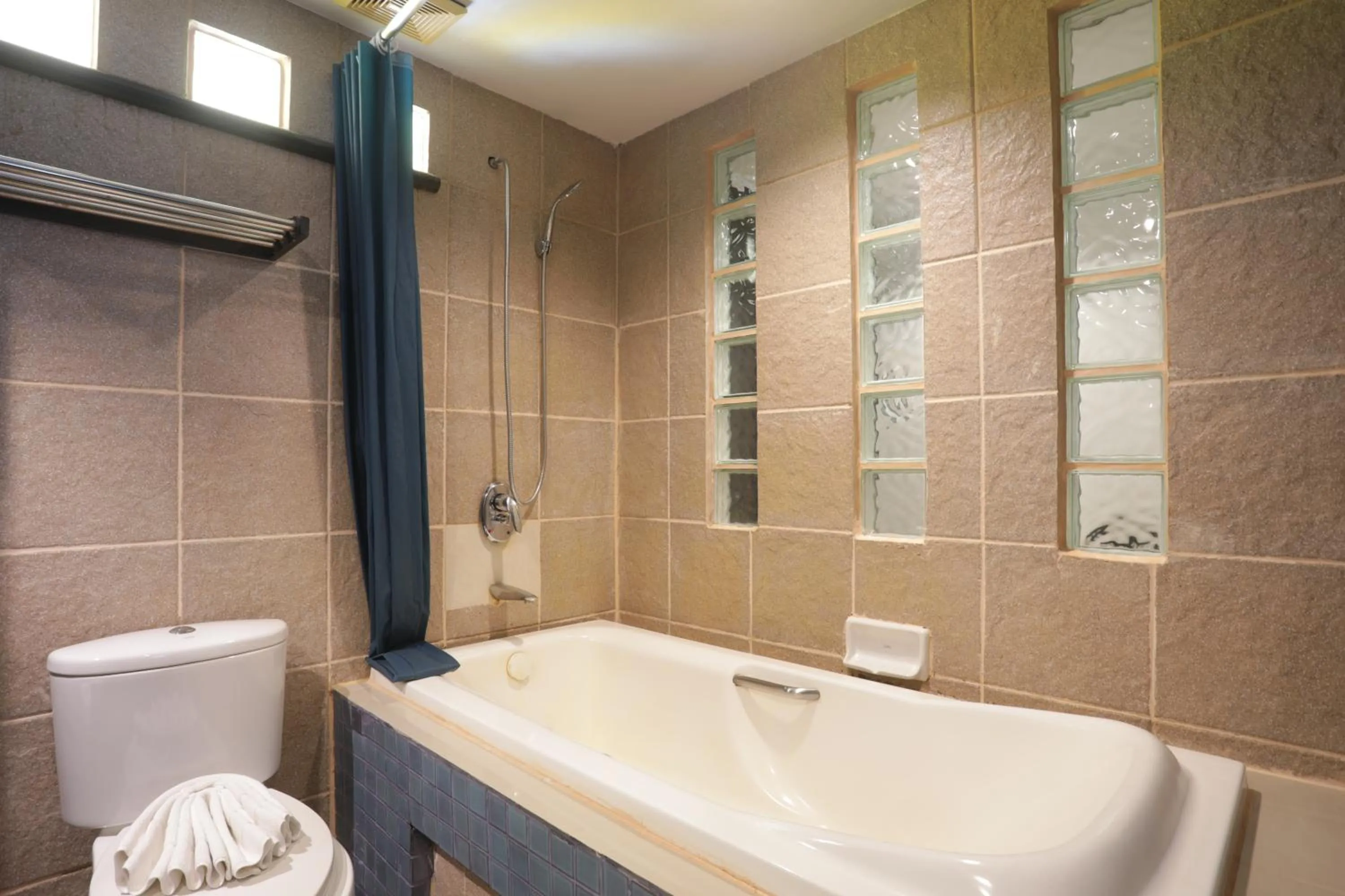 Bathroom in Woraburi Phuket Resort & Spa - SHA Plus