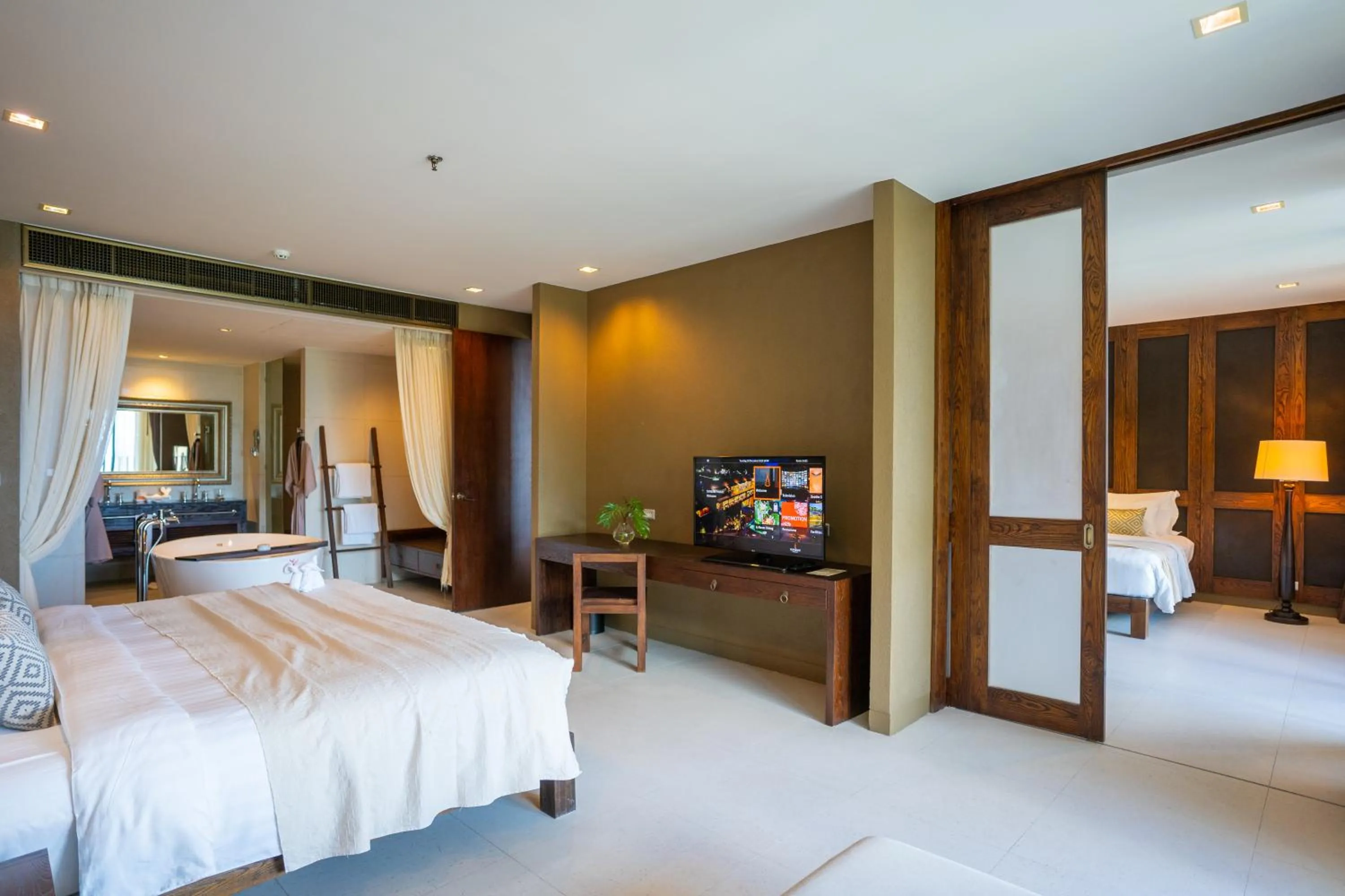 Photo of the whole room, Bed in SUNSURI PHUKET, Nai Harn Beach