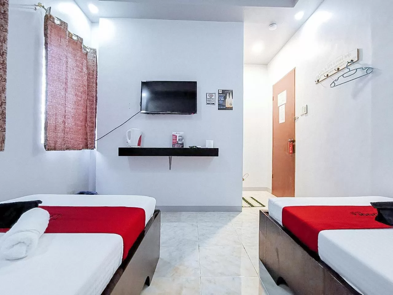 TV and multimedia, Bed in RedDoorz near Notre Dame of Dadiangas University