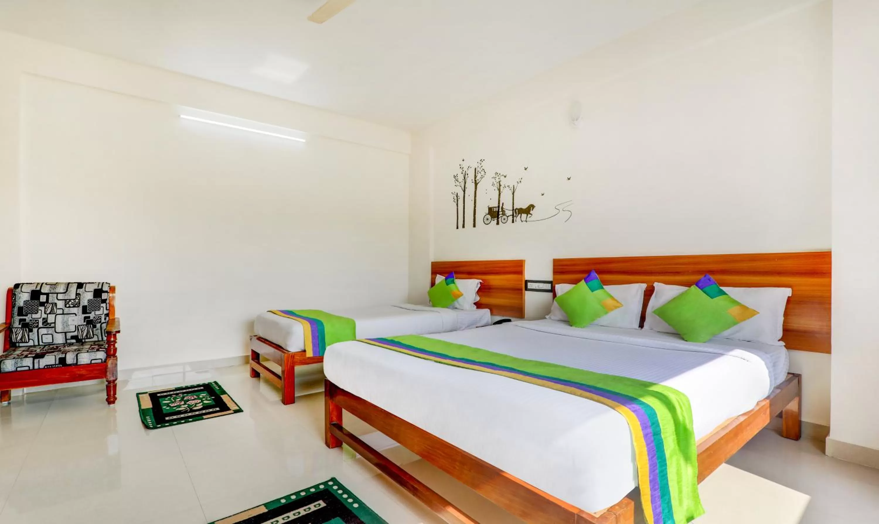 Bedroom, Bed in Treebo Atithi Comforts, 1 Km From Nisargadhama Forest